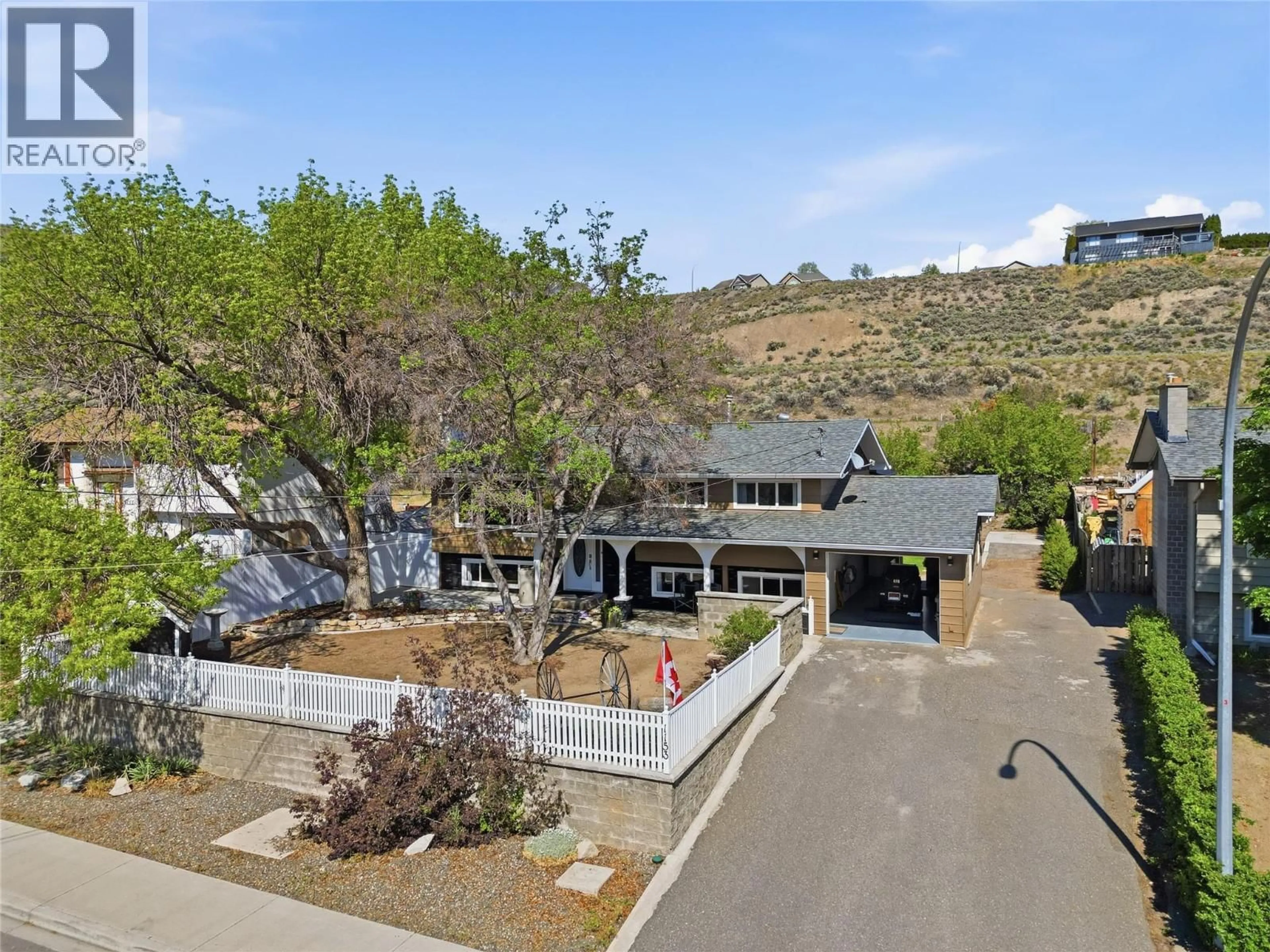 A pic from outside/outdoor area/front of a property/back of a property/a pic from drone, mountain view for 1153 MACLEAN DRIVE, Cache Creek British Columbia V0K1H0