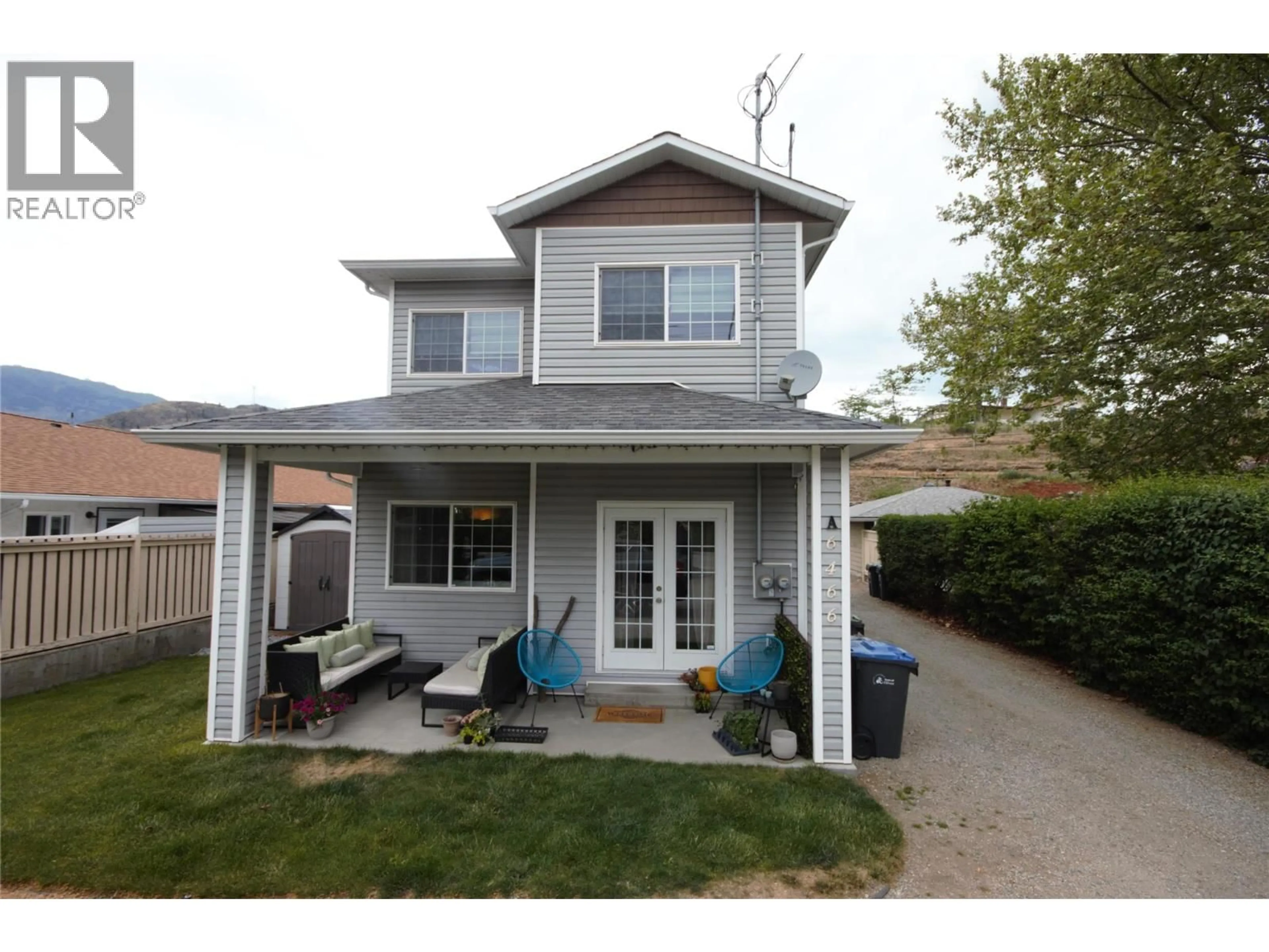Home with vinyl exterior material, street for 6466 PARK DRIVE, Oliver British Columbia V0H1T3