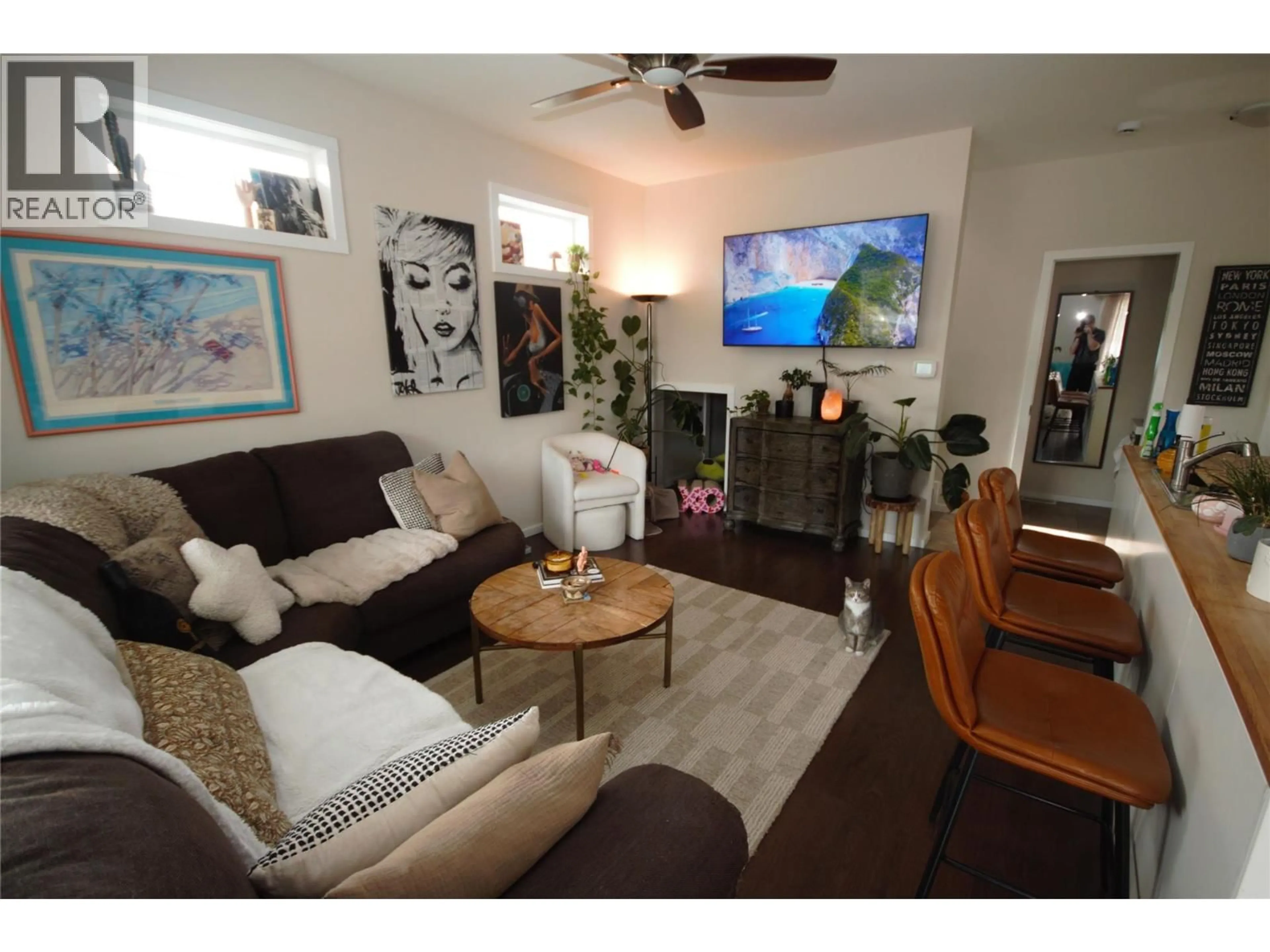 Living room with furniture, wood/laminate floor for 6466 PARK DRIVE, Oliver British Columbia V0H1T3