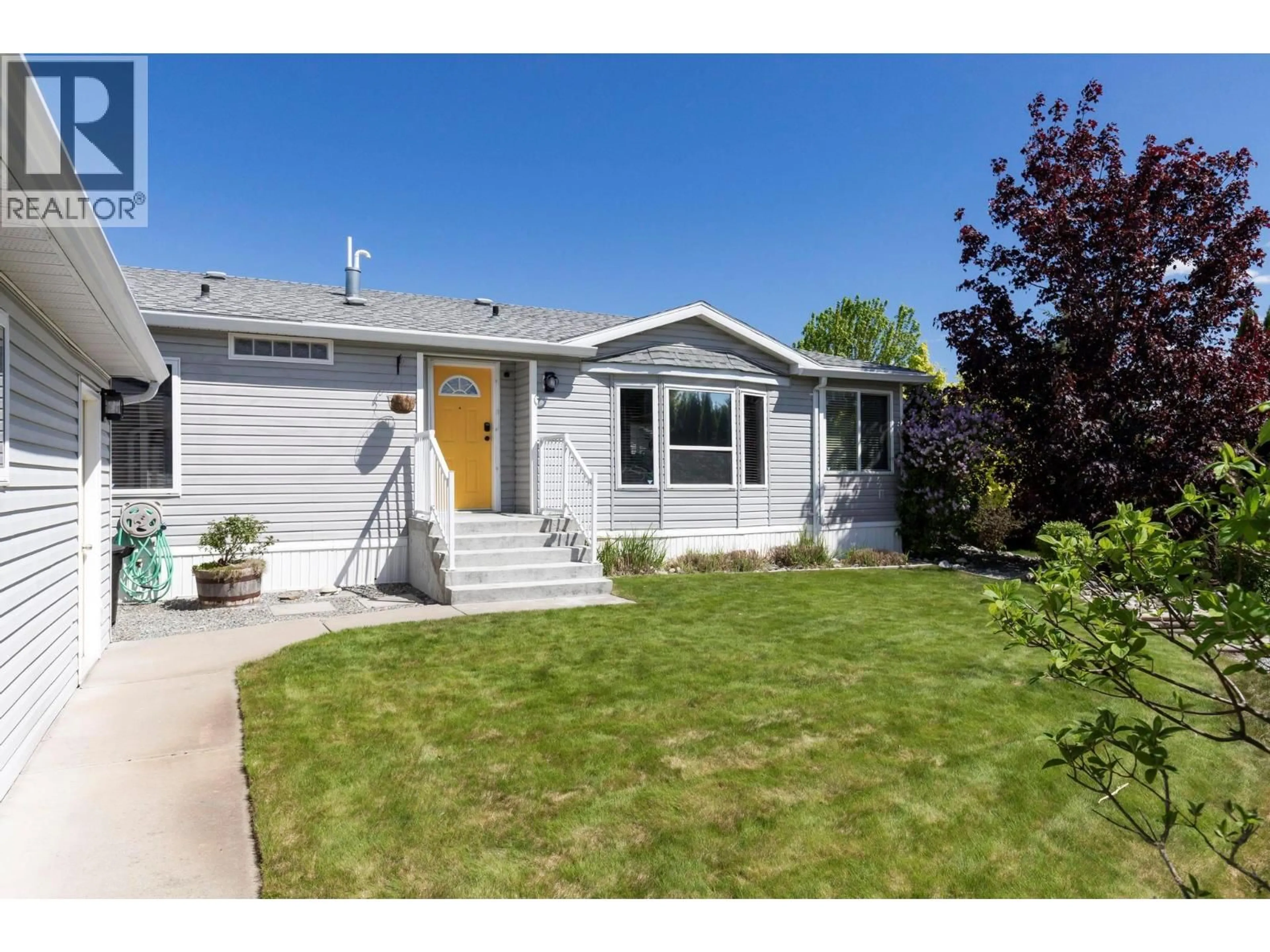Home with vinyl exterior material, street for 96 - 9510 HWY 97 N HIGHWAY, Vernon British Columbia V1H1R8