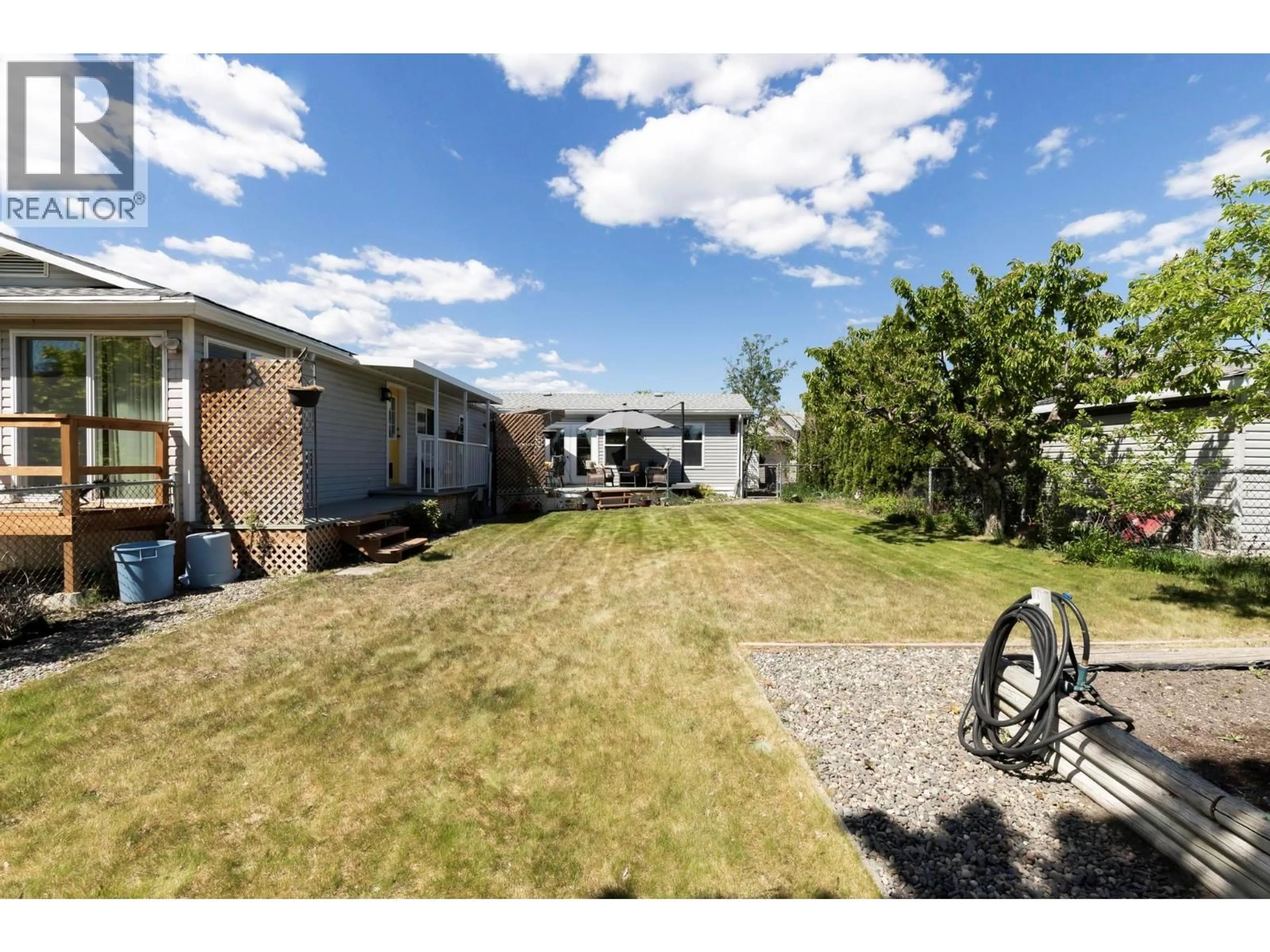 A pic from outside/outdoor area/front of a property/back of a property/a pic from drone, street for 96 - 9510 HWY 97 N HIGHWAY, Vernon British Columbia V1H1R8