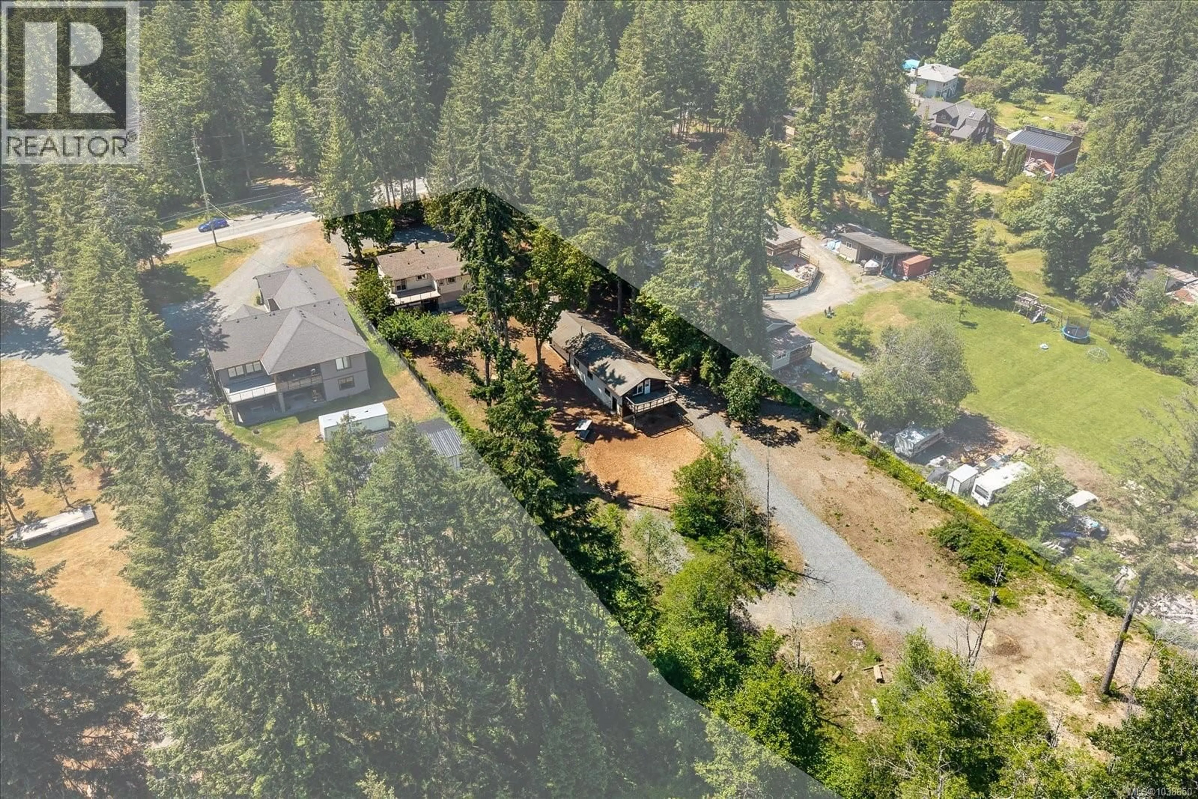 A pic from outside/outdoor area/front of a property/back of a property/a pic from drone, forest/trees view for 8959 CHEMAINUS ROAD, Chemainus British Columbia V0R1K5