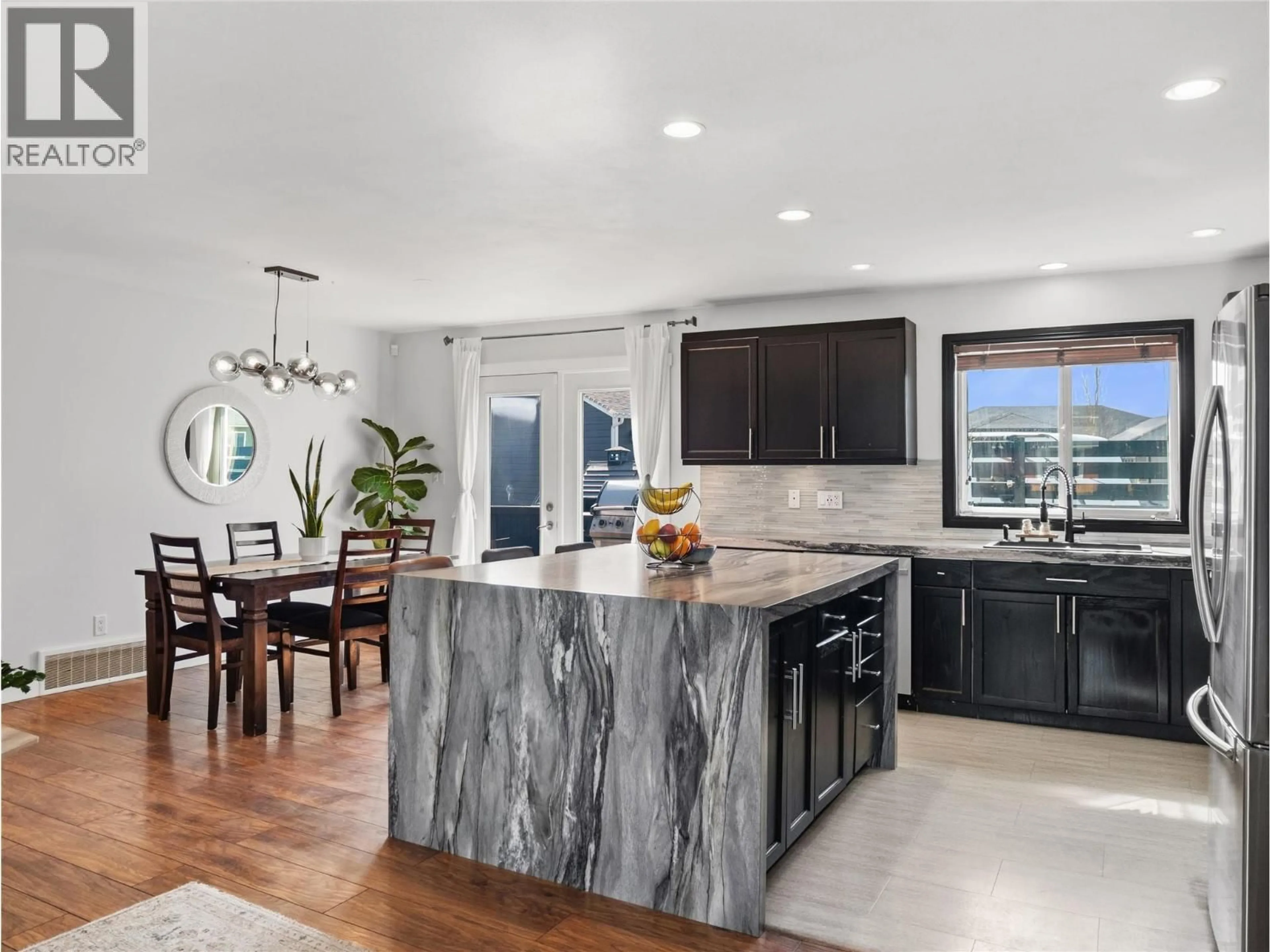 Open concept kitchen, ceramic/tile floor for 9101 19 STREET, Dawson Creek British Columbia V1G4E3