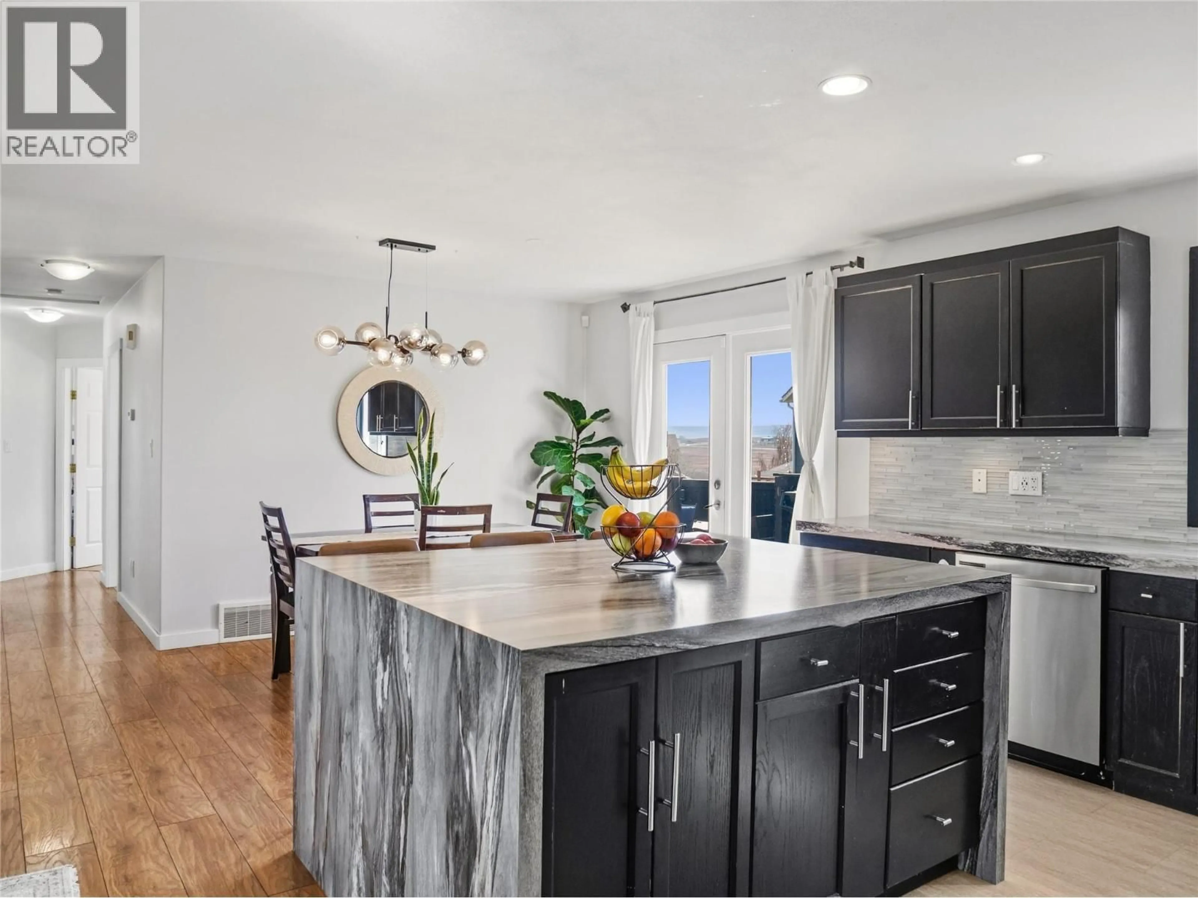 Open concept kitchen, ceramic/tile floor for 9101 19 STREET, Dawson Creek British Columbia V1G4E3