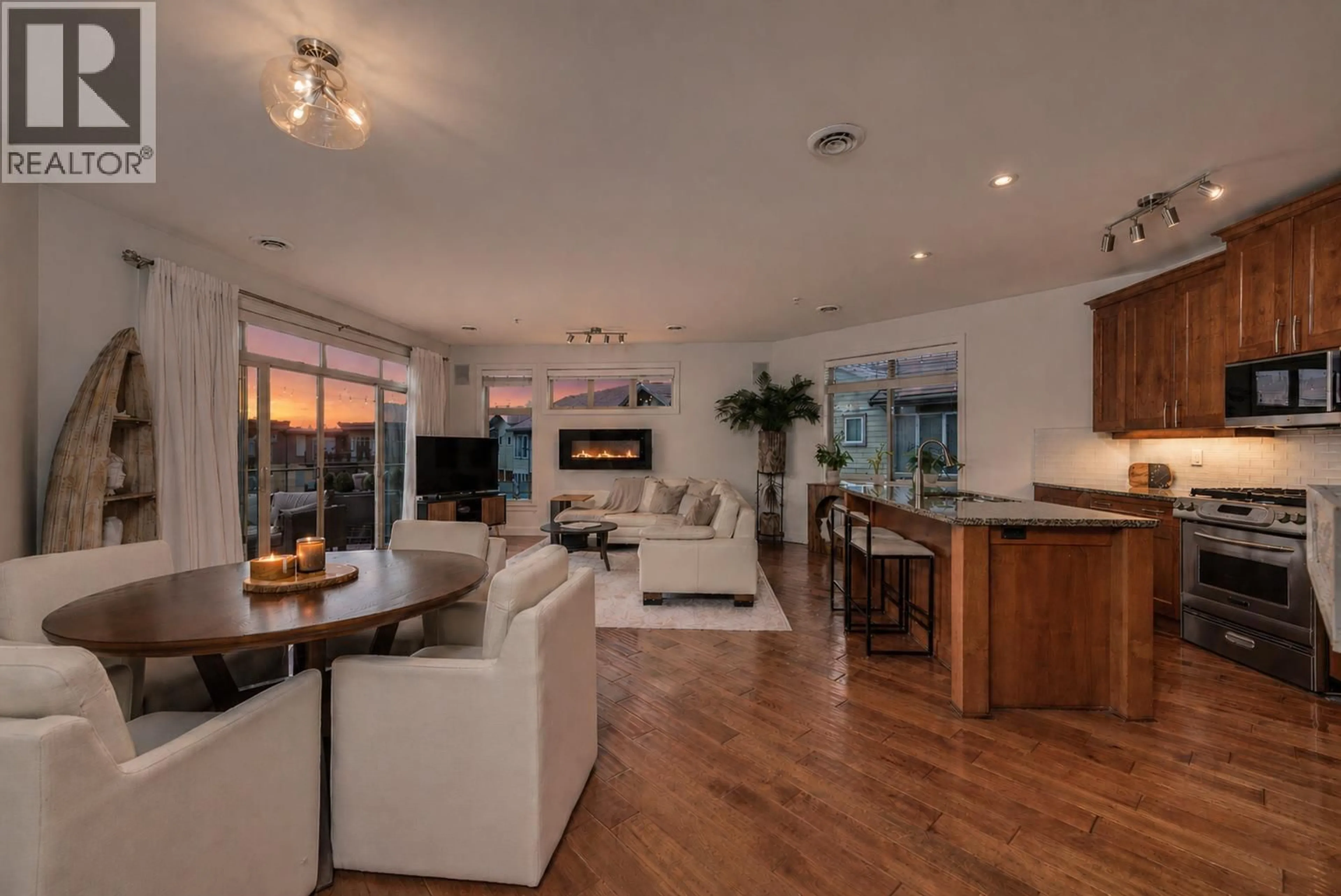 Open concept kitchen, wood/laminate floor for 6404 - 4026 PRITCHARD DRIVE NORTH, West Kelowna British Columbia V4T3E4