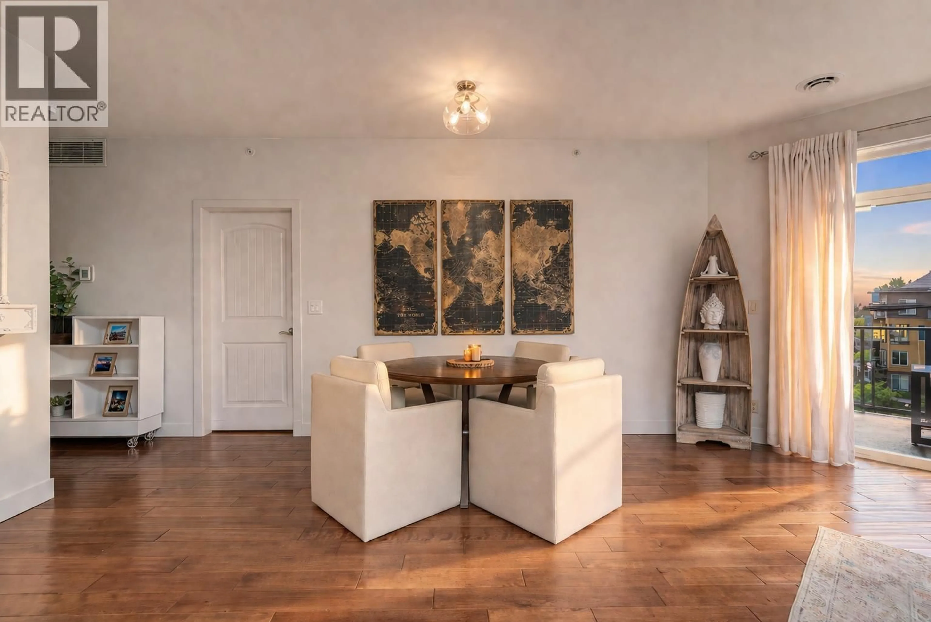 Living room with furniture, wood/laminate floor for 6404 - 4026 PRITCHARD DRIVE NORTH, West Kelowna British Columbia V4T3E4