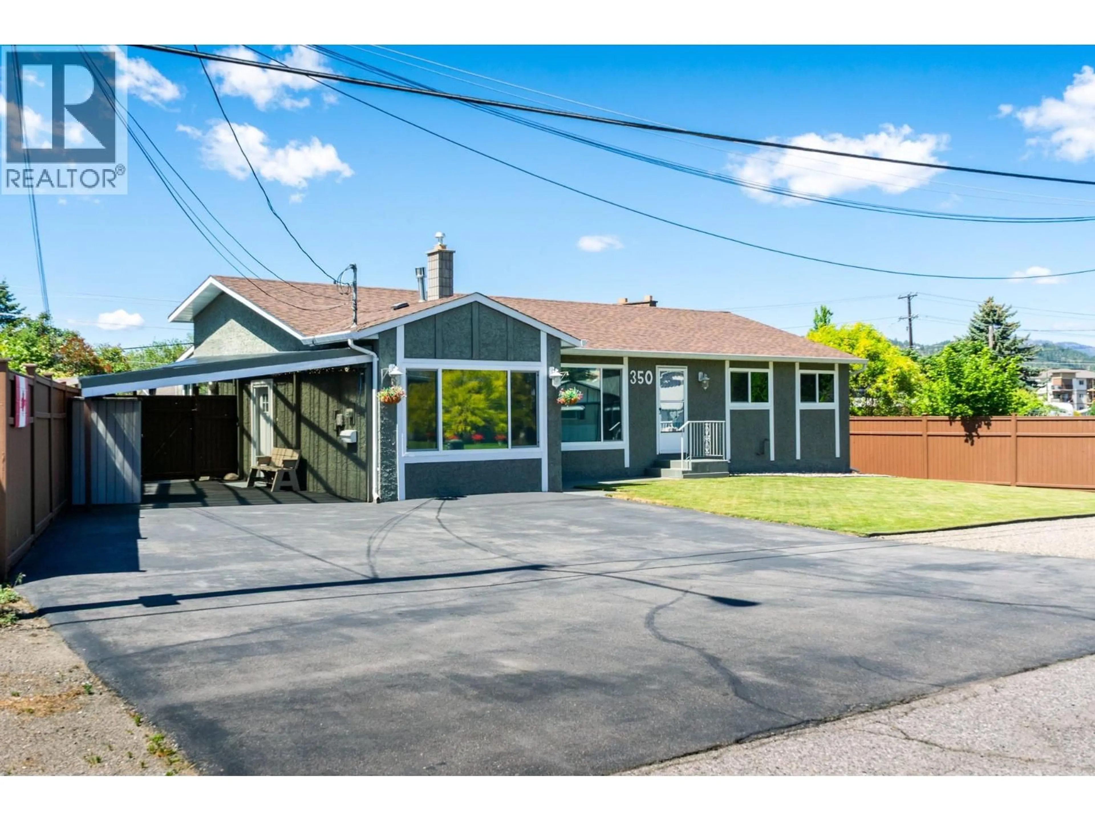 A pic from outside/outdoor area/front of a property/back of a property/a pic from drone, street for 350 PERTH ROAD, Kelowna British Columbia V1X3R4