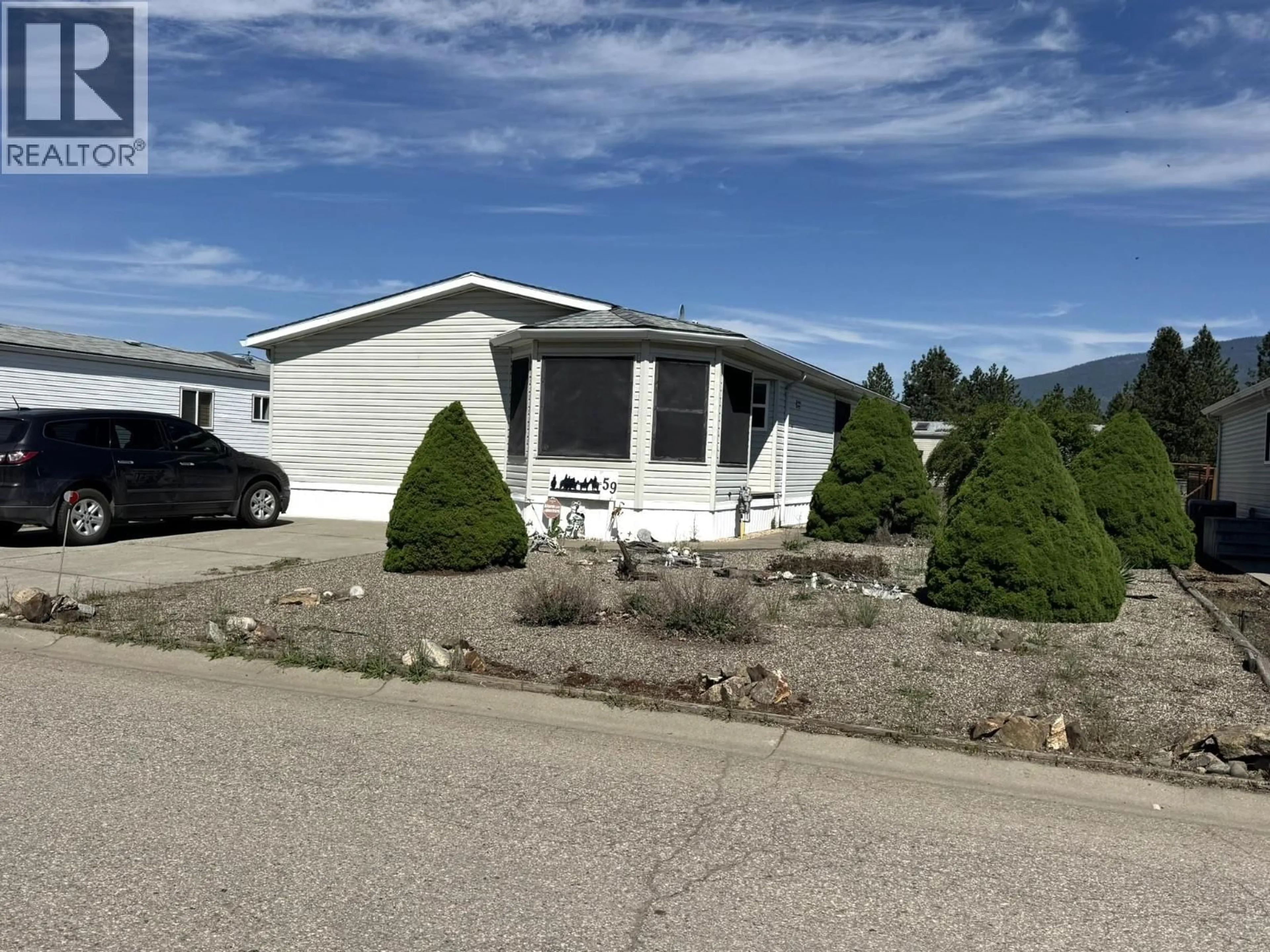 Home with vinyl exterior material, mountain view for 59 - 9510 HIGHWAY 97N OTHER, Vernon British Columbia V1H1R8