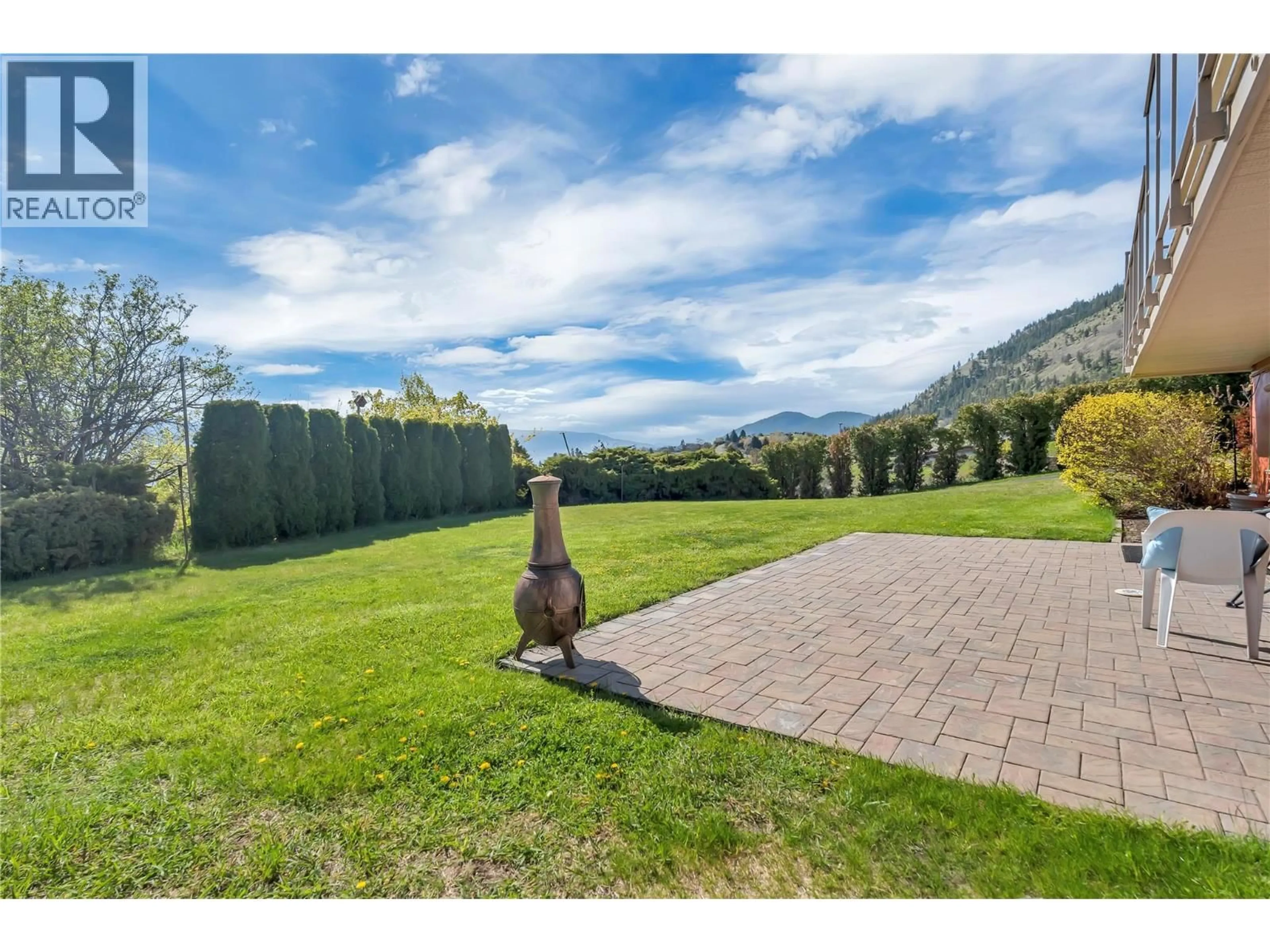 A pic from outside/outdoor area/front of a property/back of a property/a pic from drone, mountain view for 13006 BRISTOW ROAD, Summerland British Columbia V0H1Z1