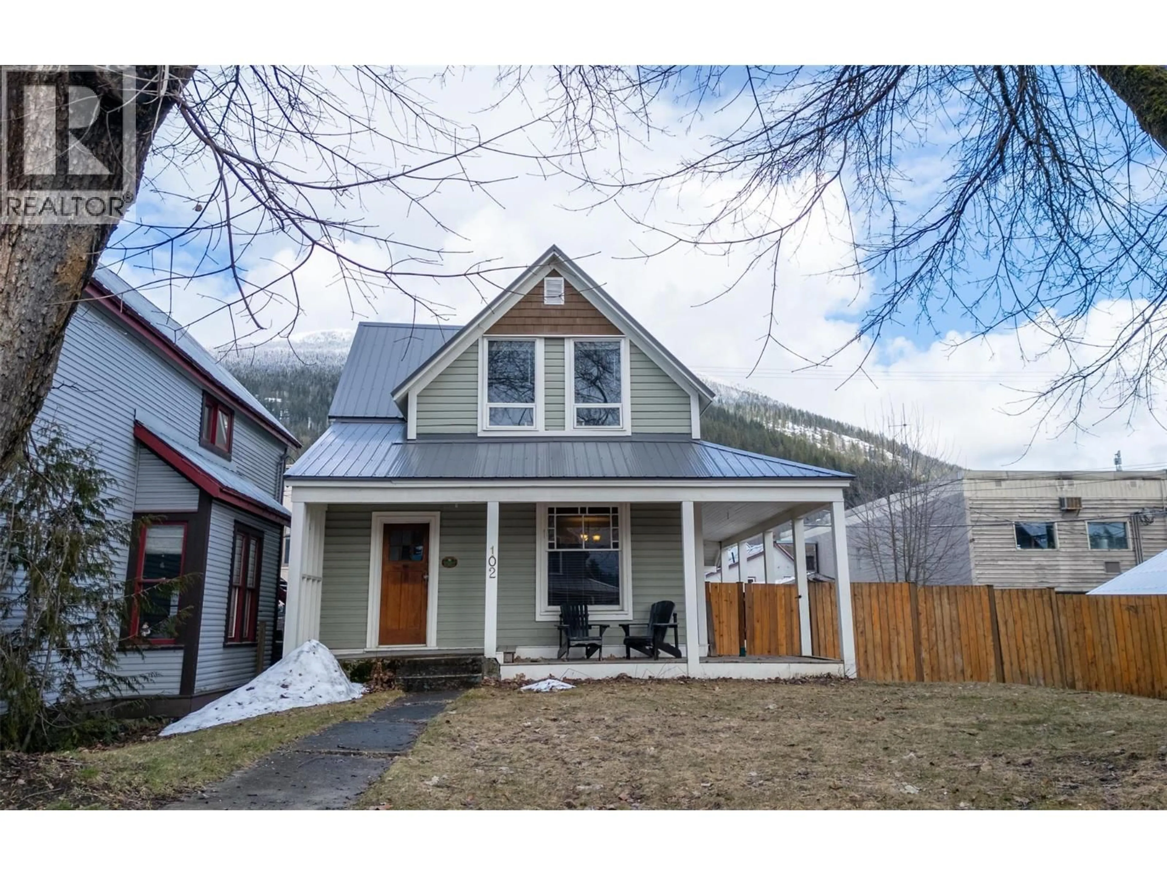 Home with vinyl exterior material, street for 102 THIRD STREET EAST, Revelstoke British Columbia V0E2S0