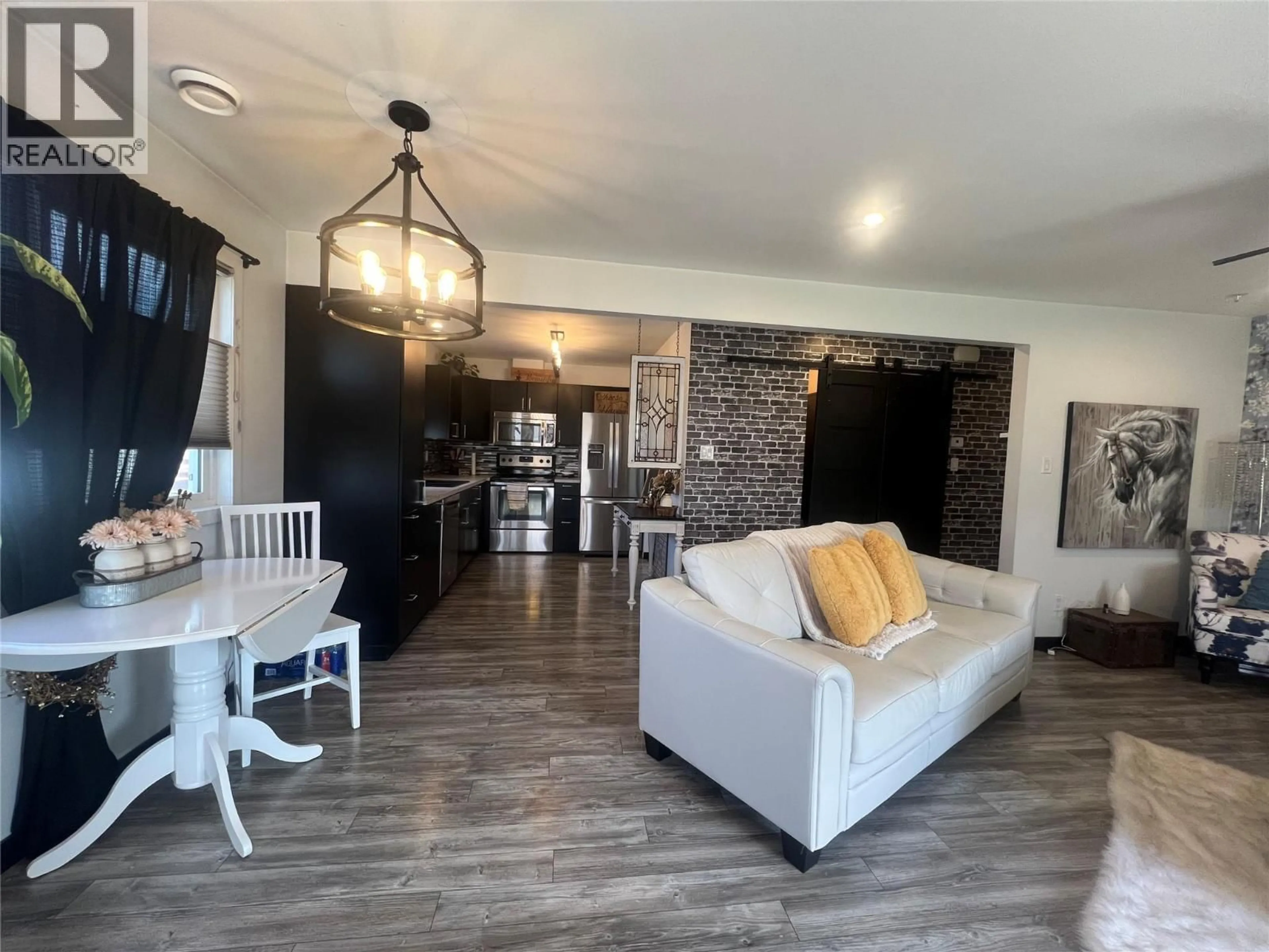 Living room with furniture, unknown for 1116 96A AVENUE, Dawson Creek British Columbia V1G1M8