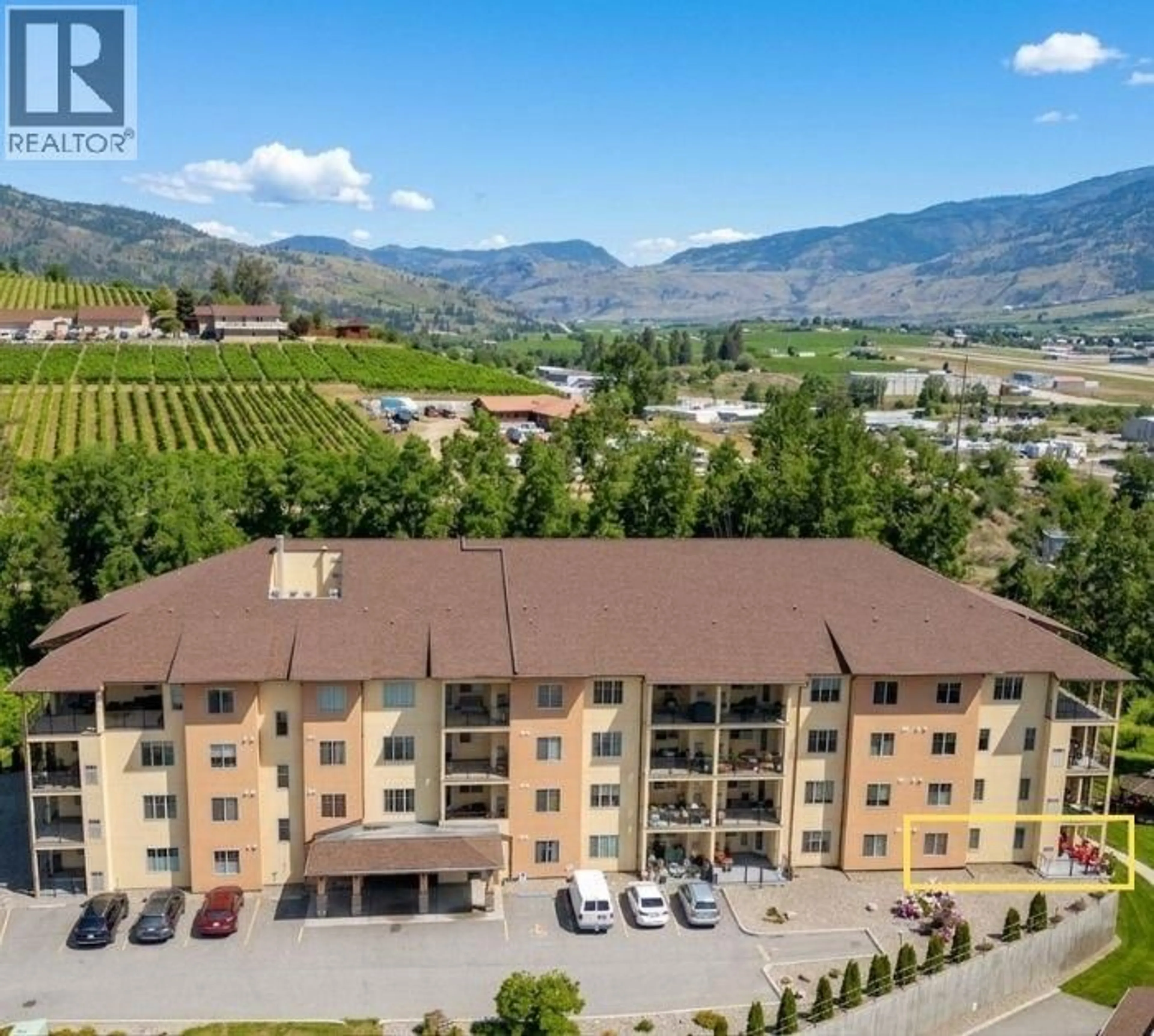 A pic from outside/outdoor area/front of a property/back of a property/a pic from drone, mountain view for 107B - 921 SPILLWAY ROAD, Oliver British Columbia V0H1T8