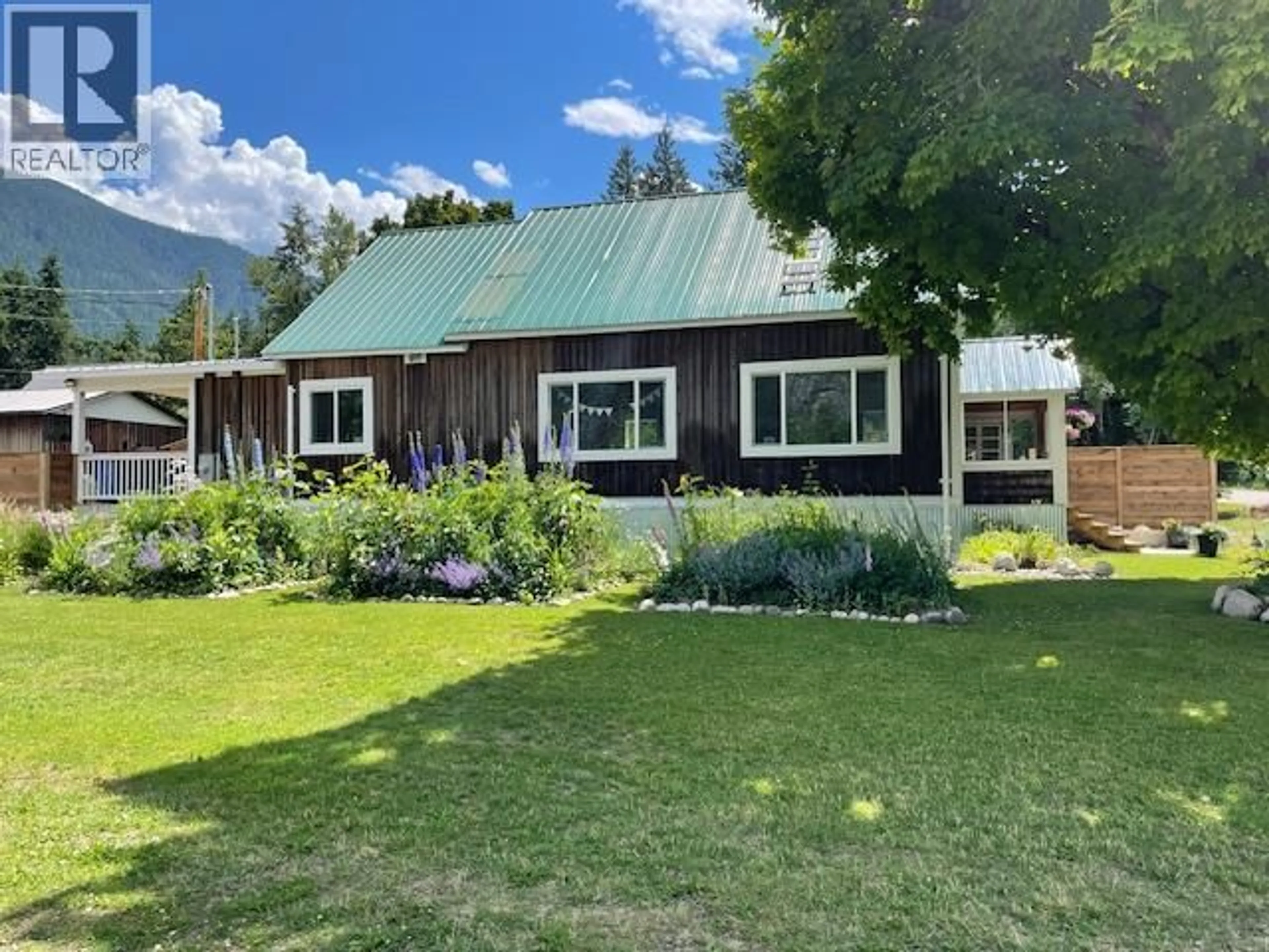 A pic from outside/outdoor area/front of a property/back of a property/a pic from drone, mountain view for 602 SLOCAN STREET, Slocan British Columbia V0G2C0