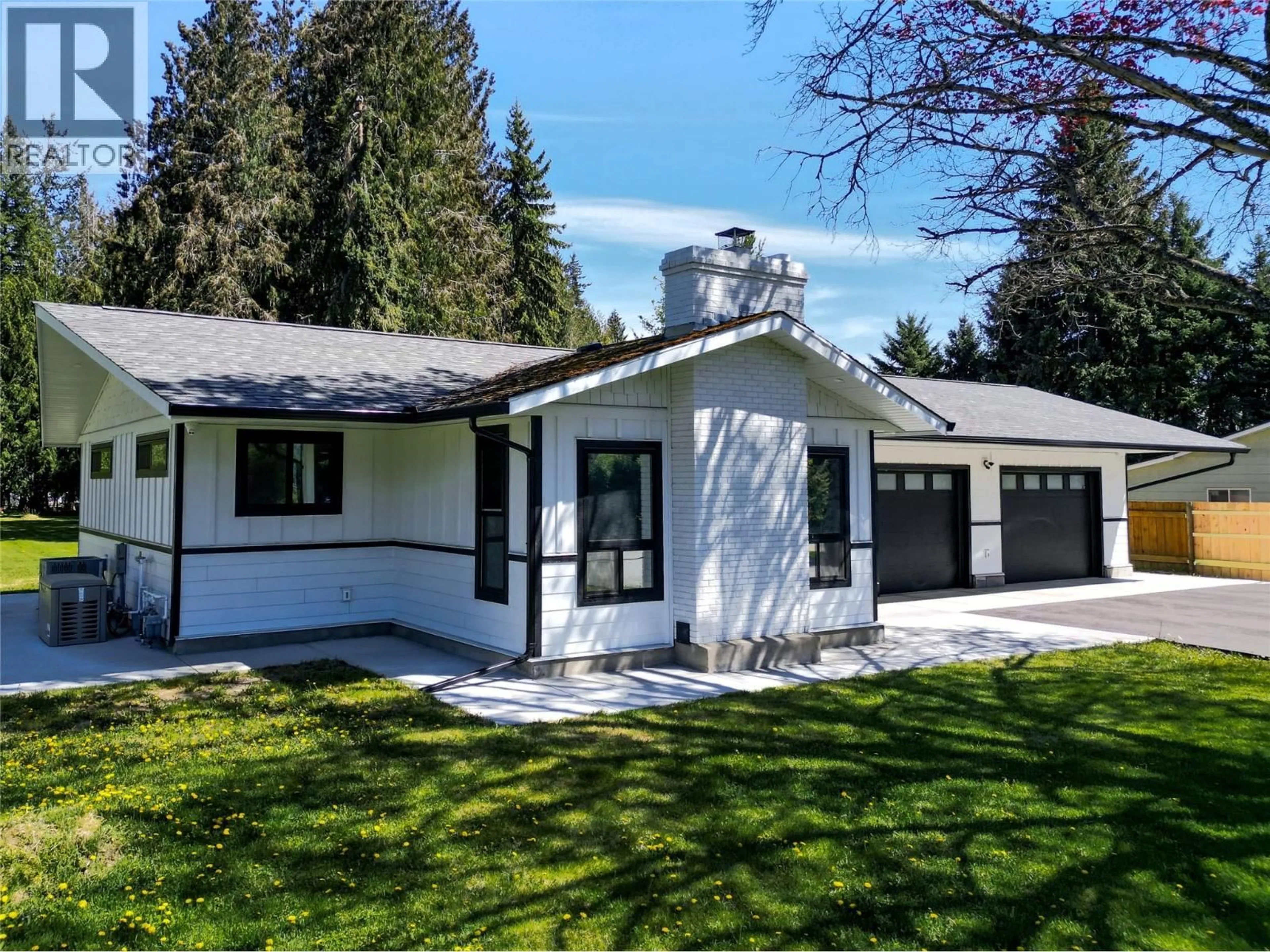 Home with vinyl exterior material, street for 6453 RANCHERO DRIVE, Salmon Arm British Columbia V1E2R1