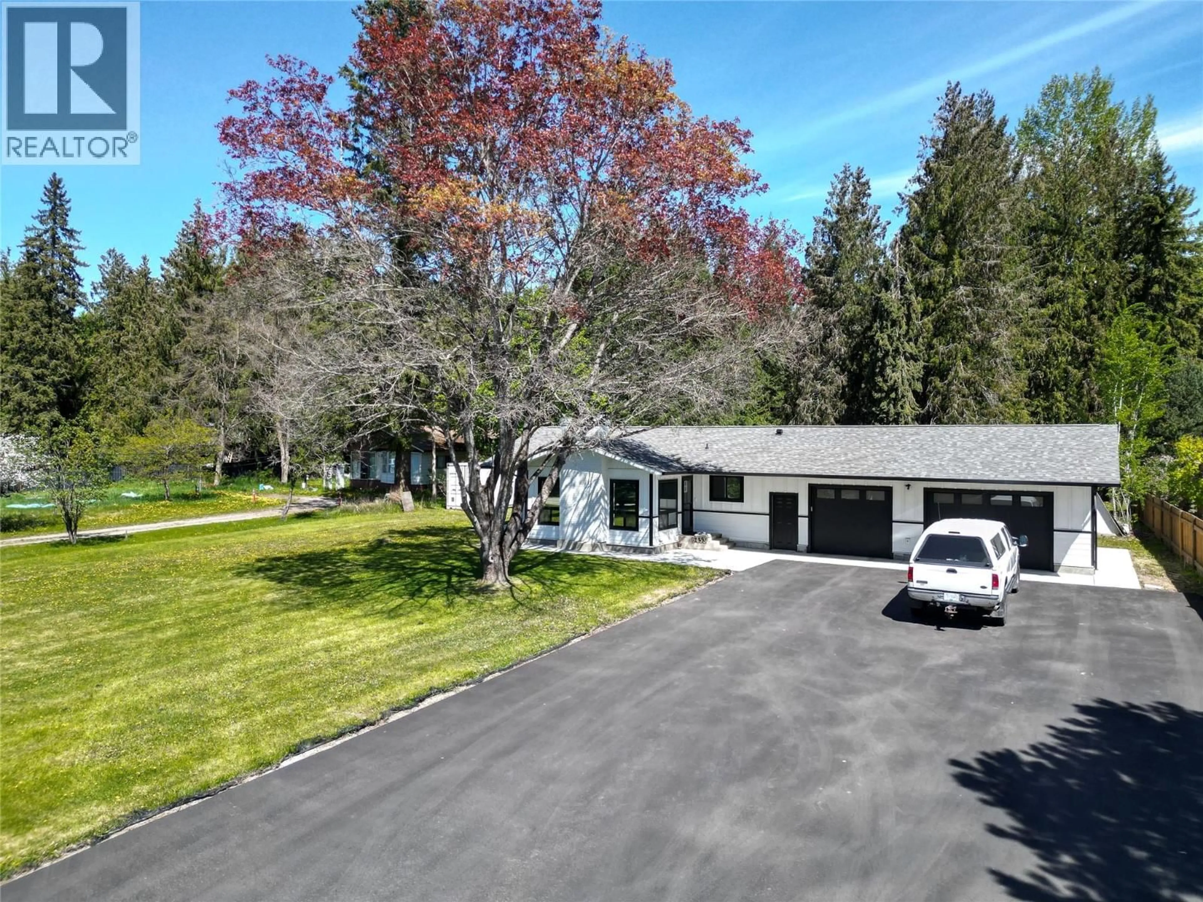 A pic from outside/outdoor area/front of a property/back of a property/a pic from drone, street for 6453 RANCHERO DRIVE, Salmon Arm British Columbia V1E2R1