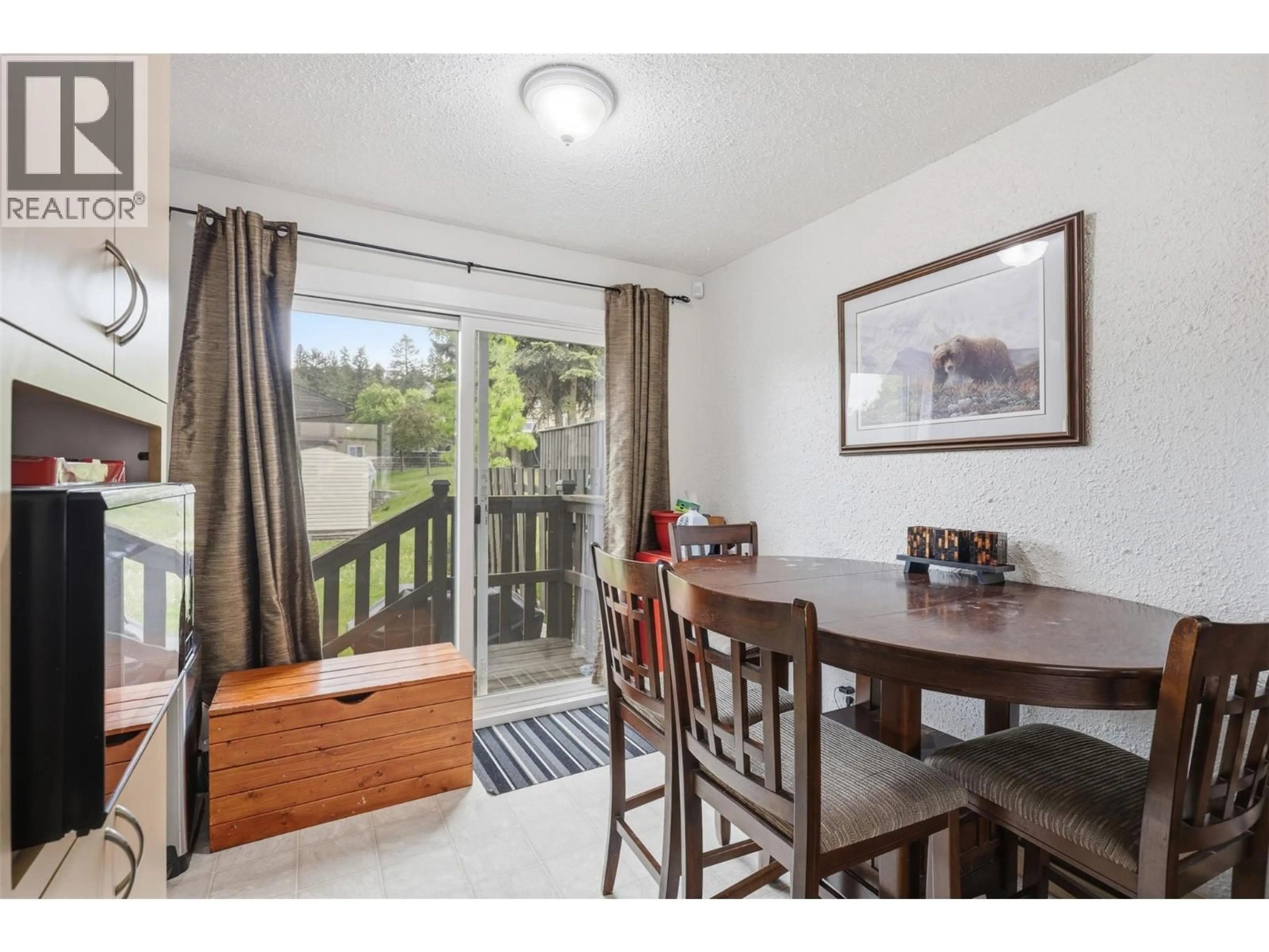 Dining room, wood/laminate floor for 8 - 1605 SUMMIT DRIVE, Kamloops British Columbia V2E2A5
