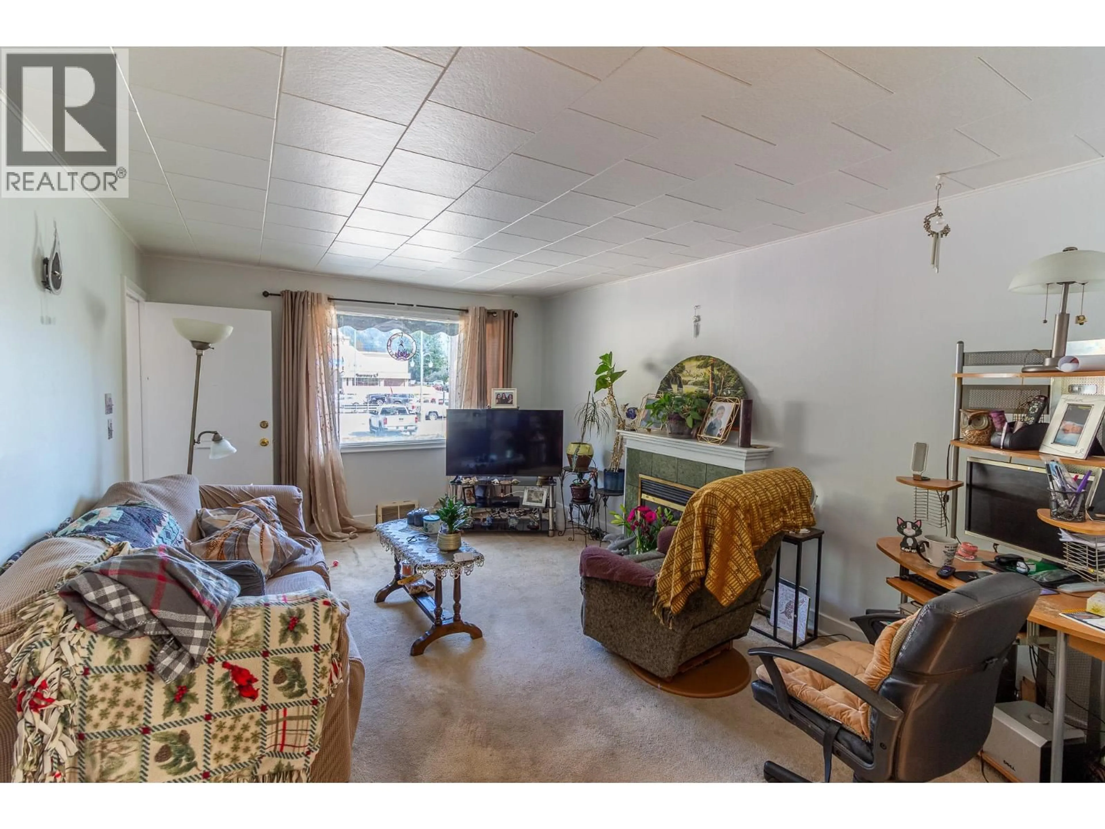 Living room with furniture, unknown for 210 ANDERSON STREET, Nelson British Columbia V1L3X1