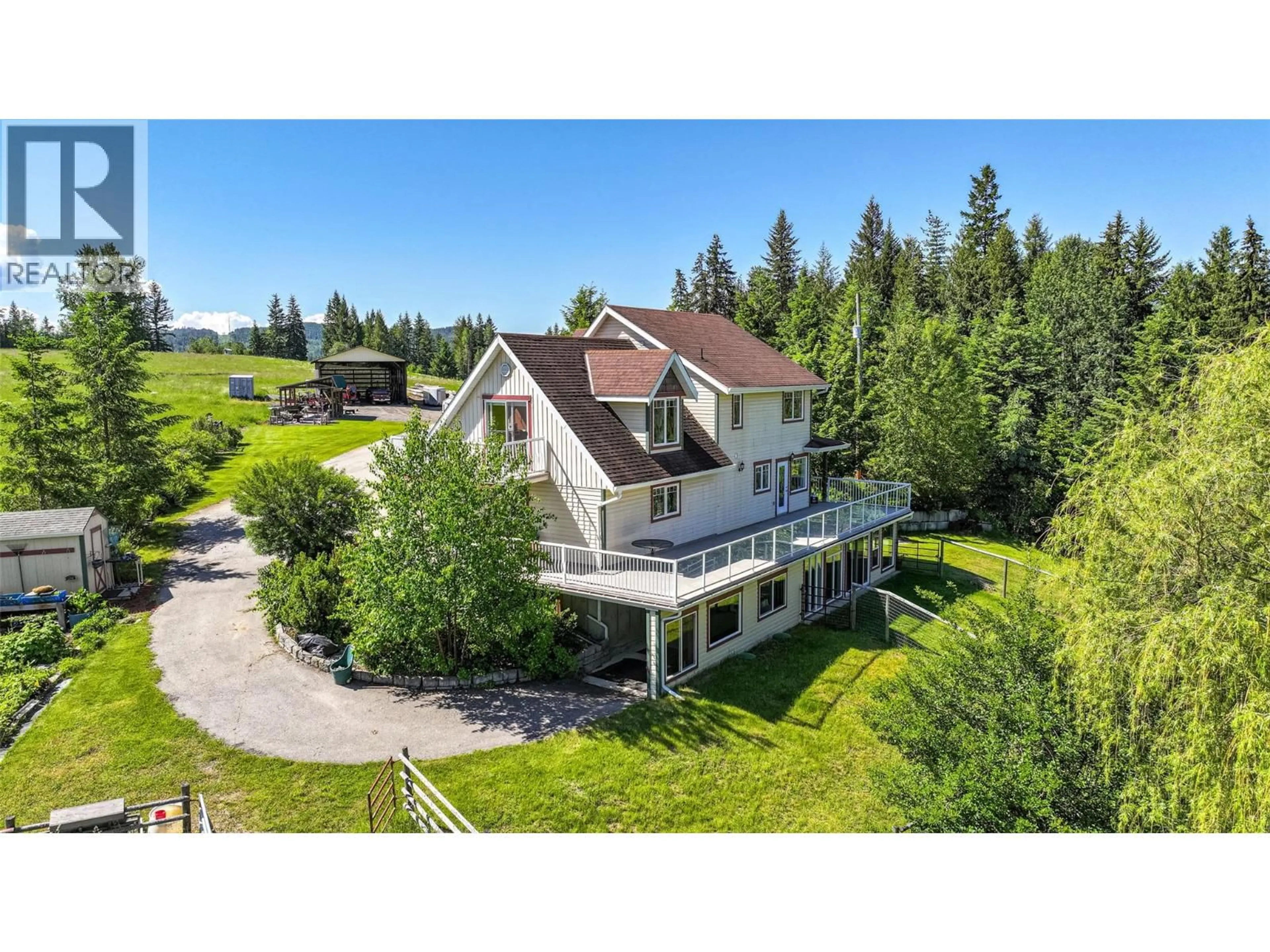 A pic from outside/outdoor area/front of a property/back of a property/a pic from drone, mountain view for 9255 FIREHALL FRONTAGE ROAD, Salmon Arm British Columbia V1E2X6