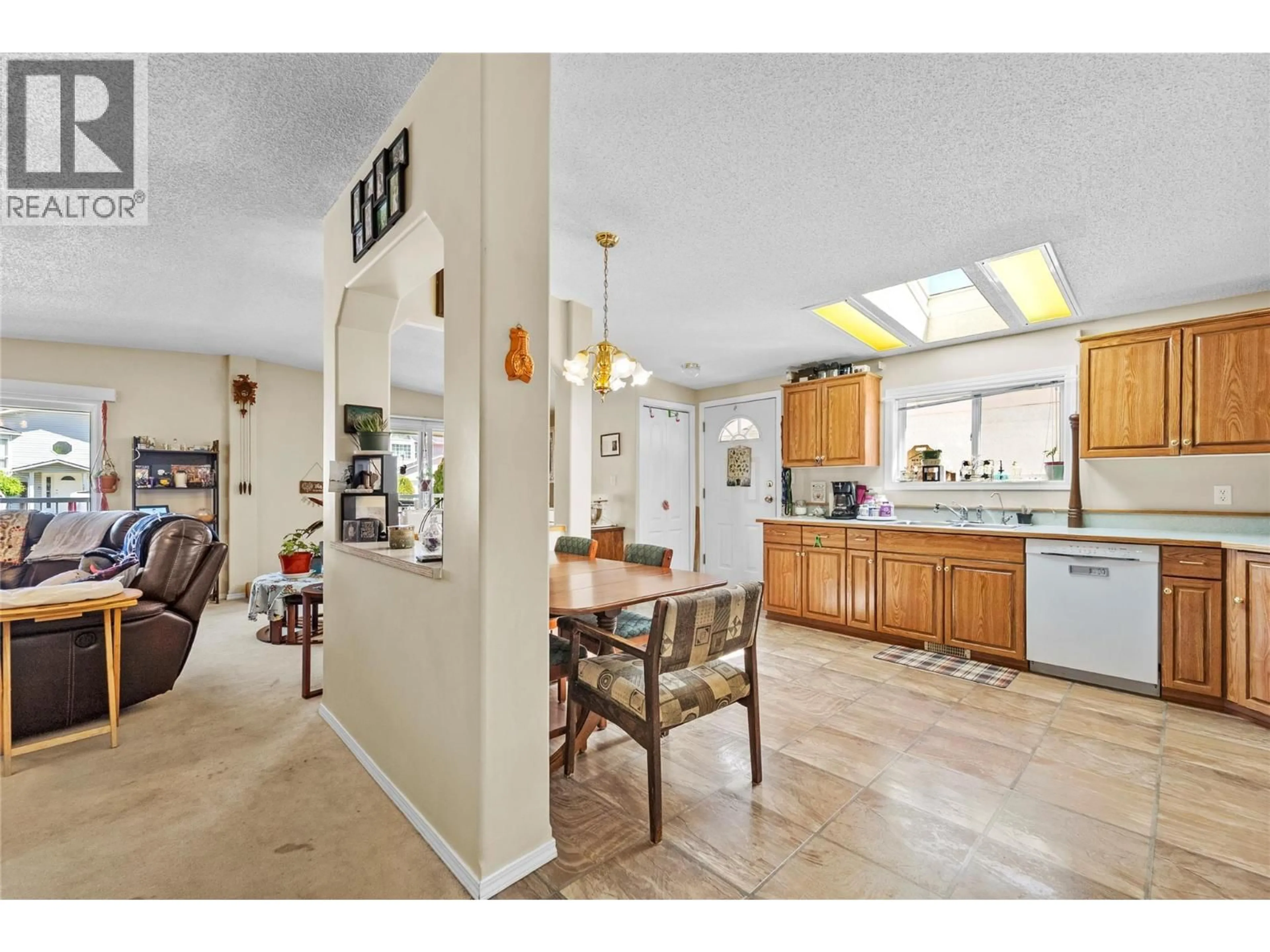 Open concept kitchen, ceramic/tile floor for 1309 SPRUCE AVENUE, Merritt British Columbia V1K1L2