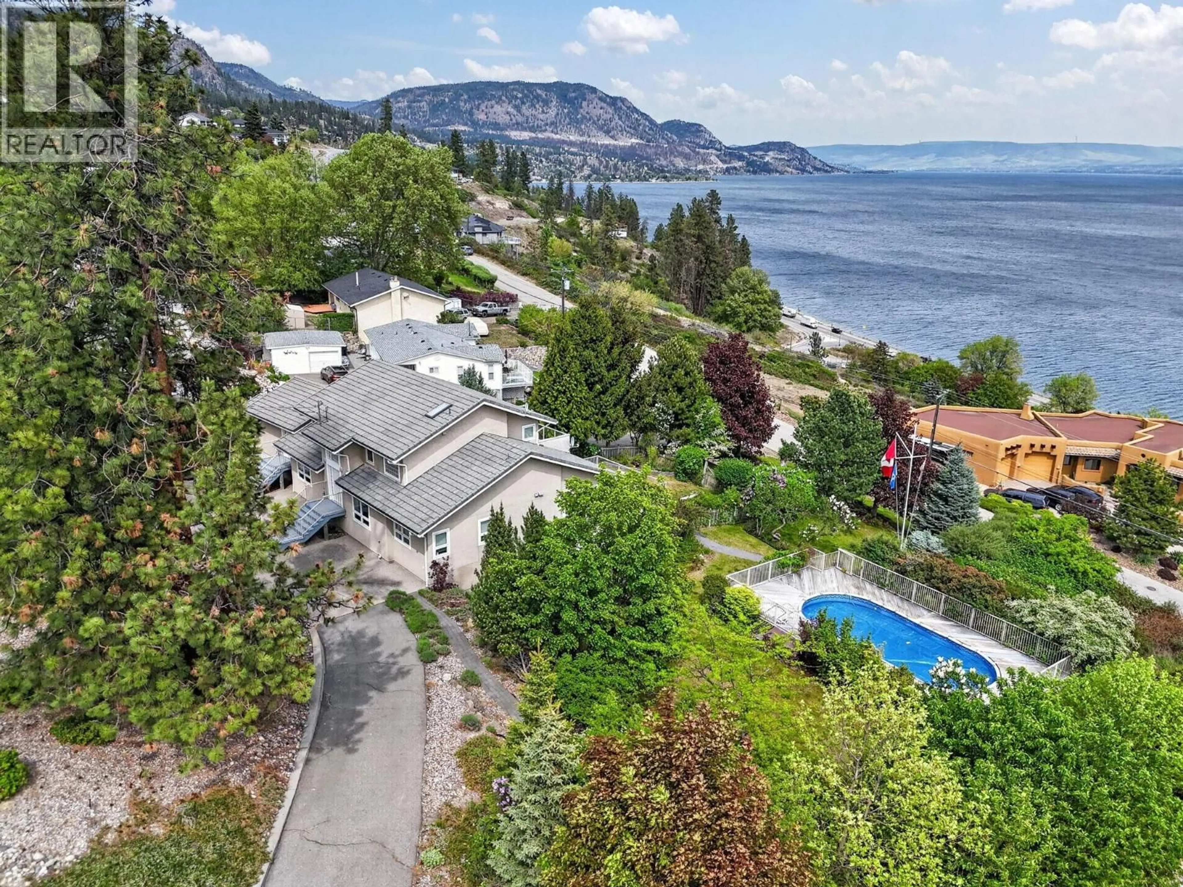 A pic from outside/outdoor area/front of a property/back of a property/a pic from drone, water/lake/river/ocean view for 6226 HEIGHWAY LANE, Peachland British Columbia V0H1X7