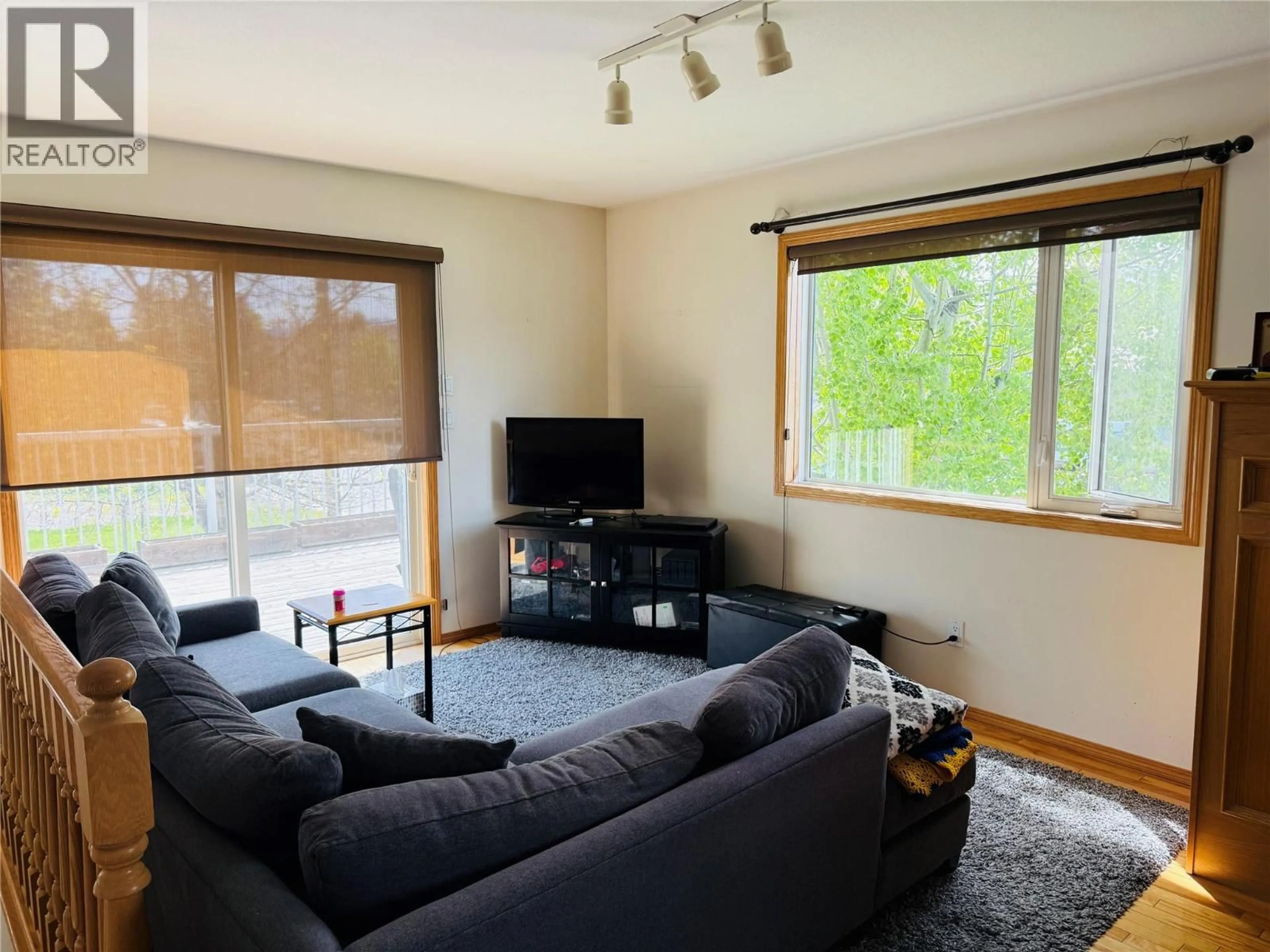 Living room with furniture, wood/laminate floor for 7506 COLUMBIA AVENUE, Radium Hot Springs British Columbia V0A1M0