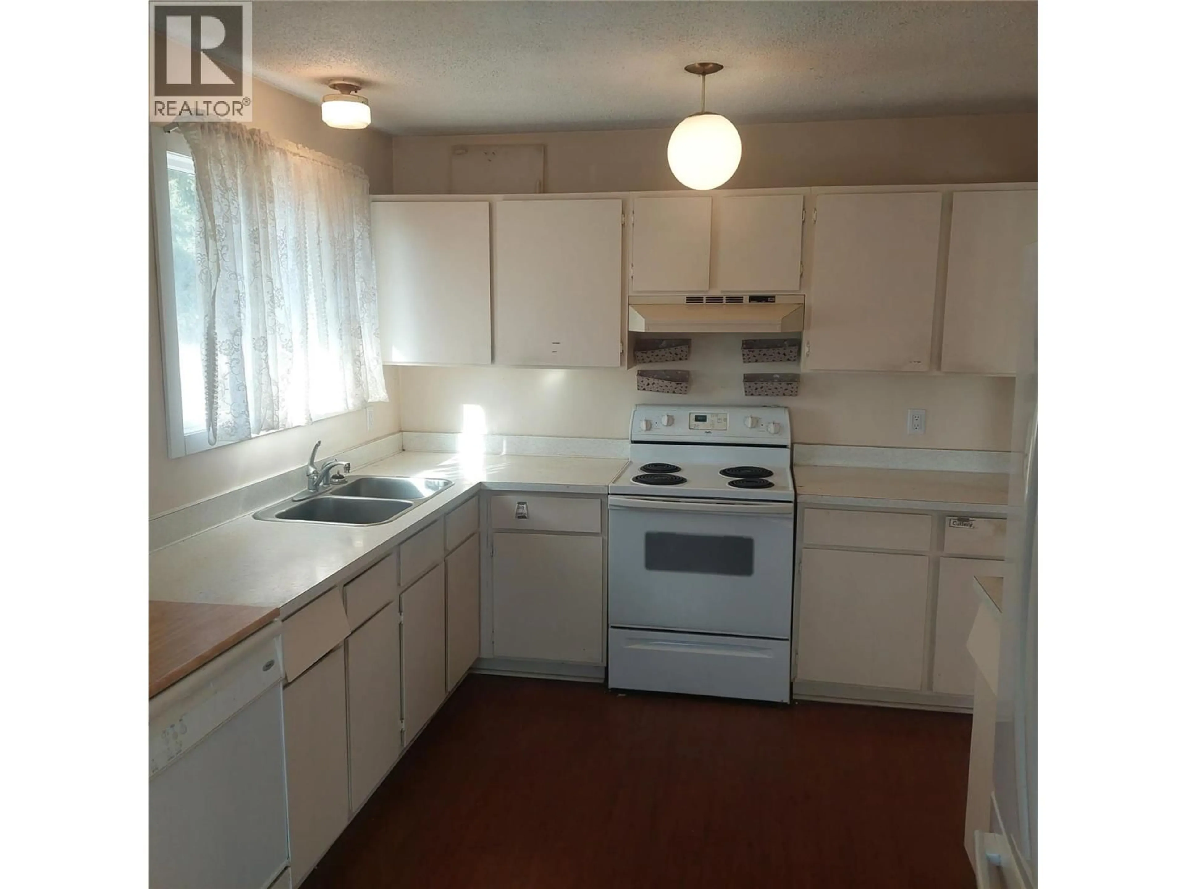 Standard kitchen, wood/laminate floor for 4403 15TH AVENUE, Vernon British Columbia V1T6Y1