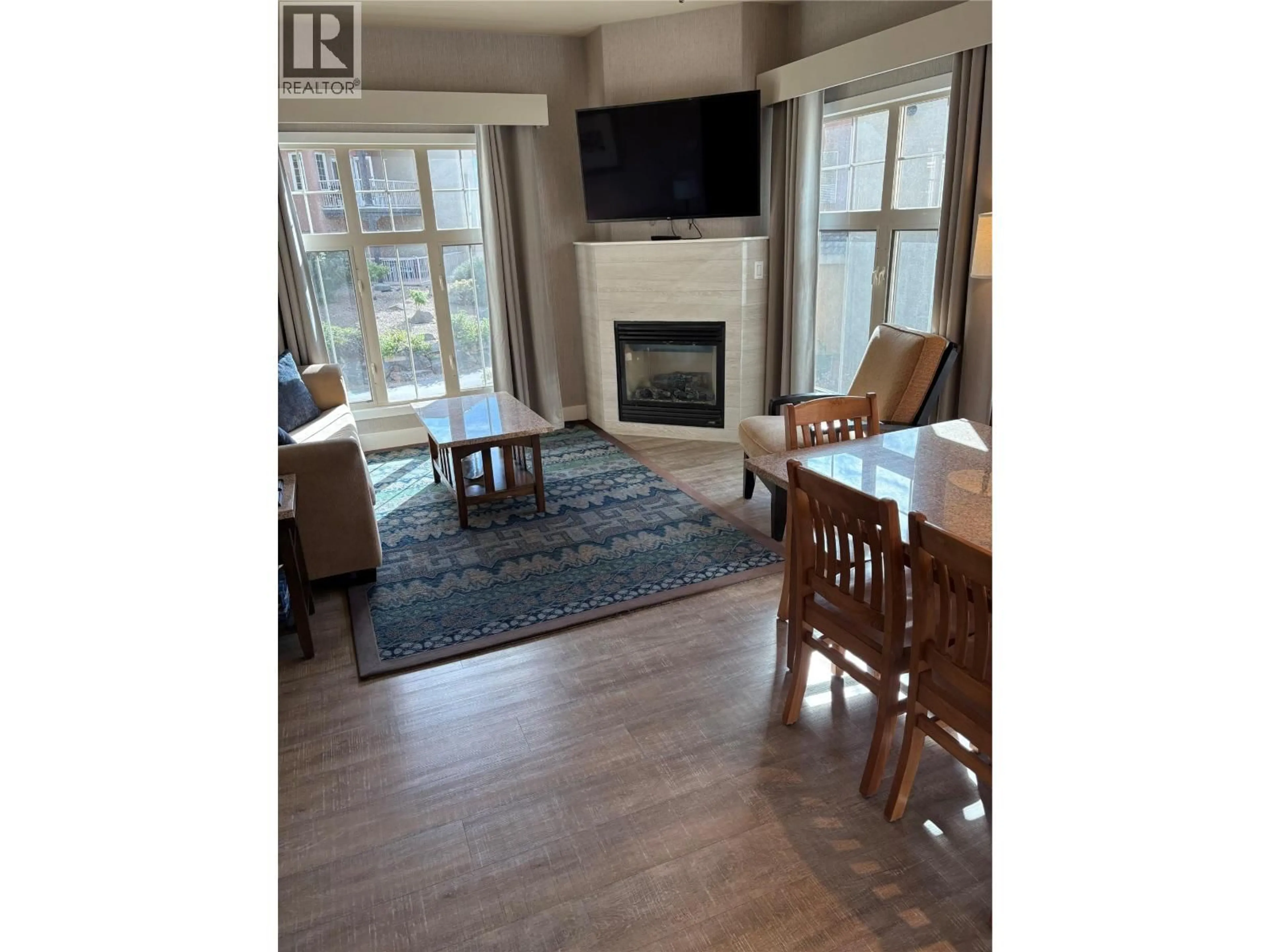 Living room with furniture, wood/laminate floor for 28C - 1200 RANCHER CREEK ROAD, Osoyoos British Columbia V0H1V6