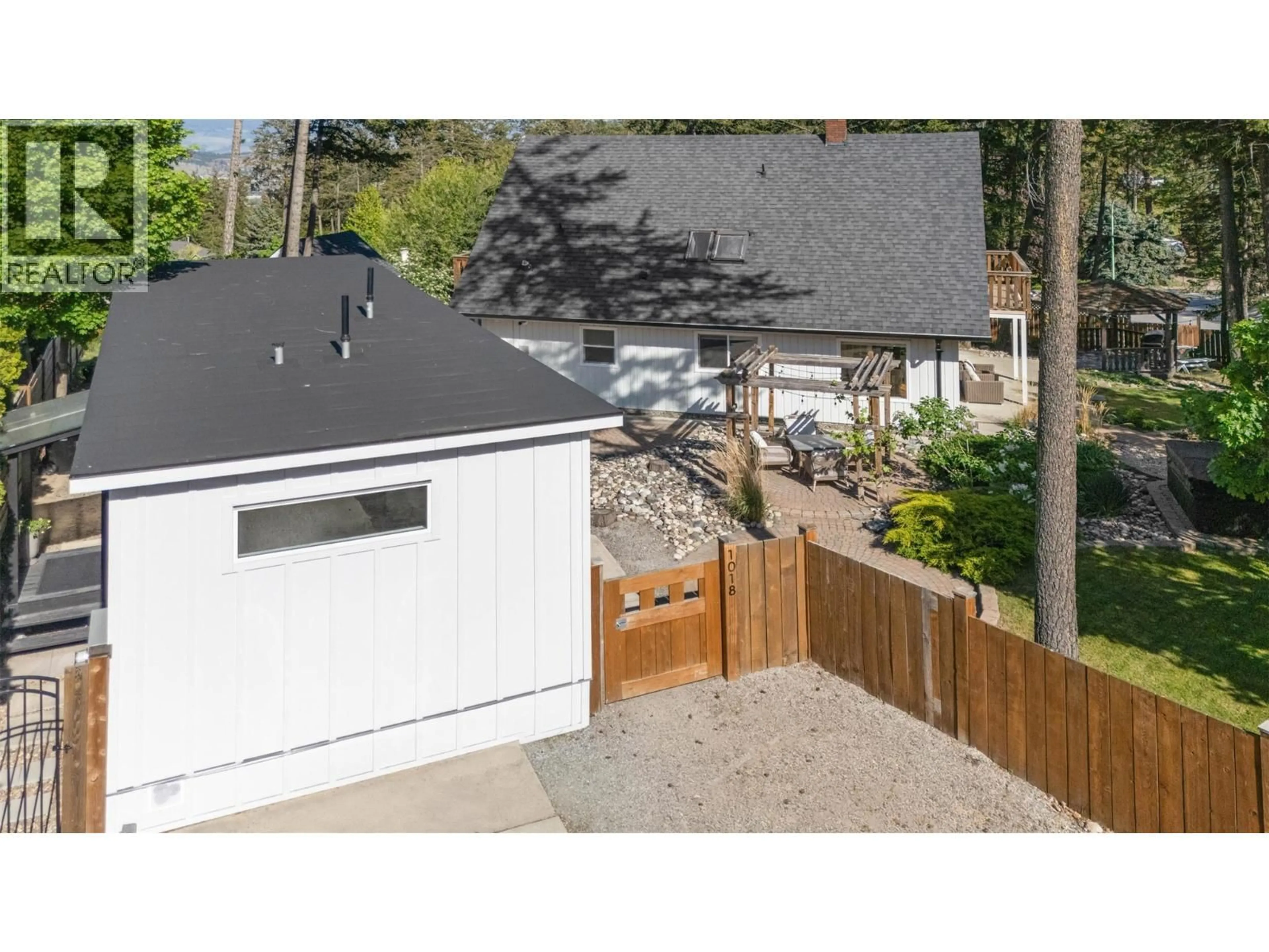 A pic from outside/outdoor area/front of a property/back of a property/a pic from drone, street for 1018 WEST KELOWNA ROAD, West Kelowna British Columbia V1Z3B7