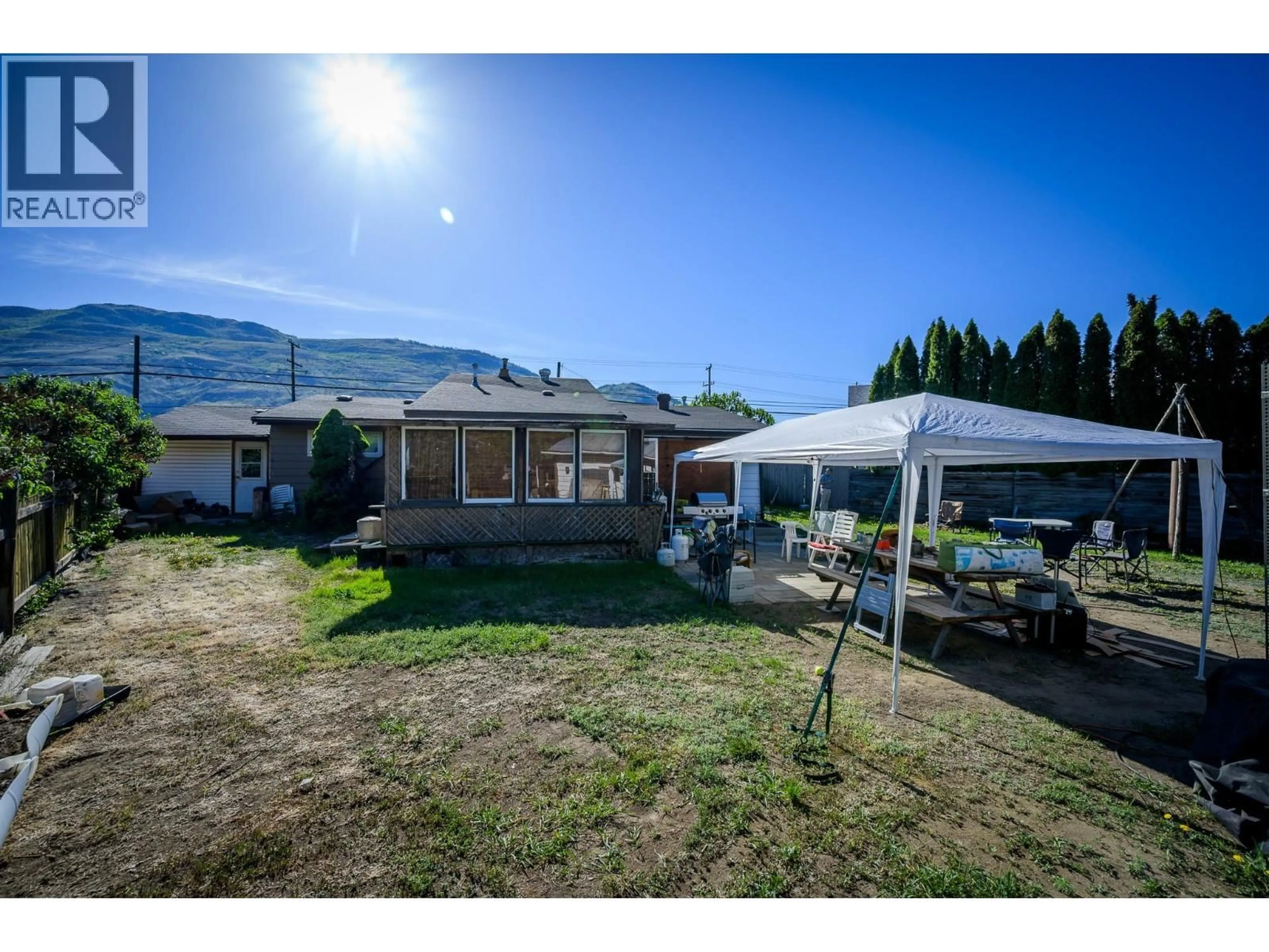 A pic from outside/outdoor area/front of a property/back of a property/a pic from drone, mountain view for 2810 WESTSYDE ROAD, Kamloops British Columbia V2B7E3