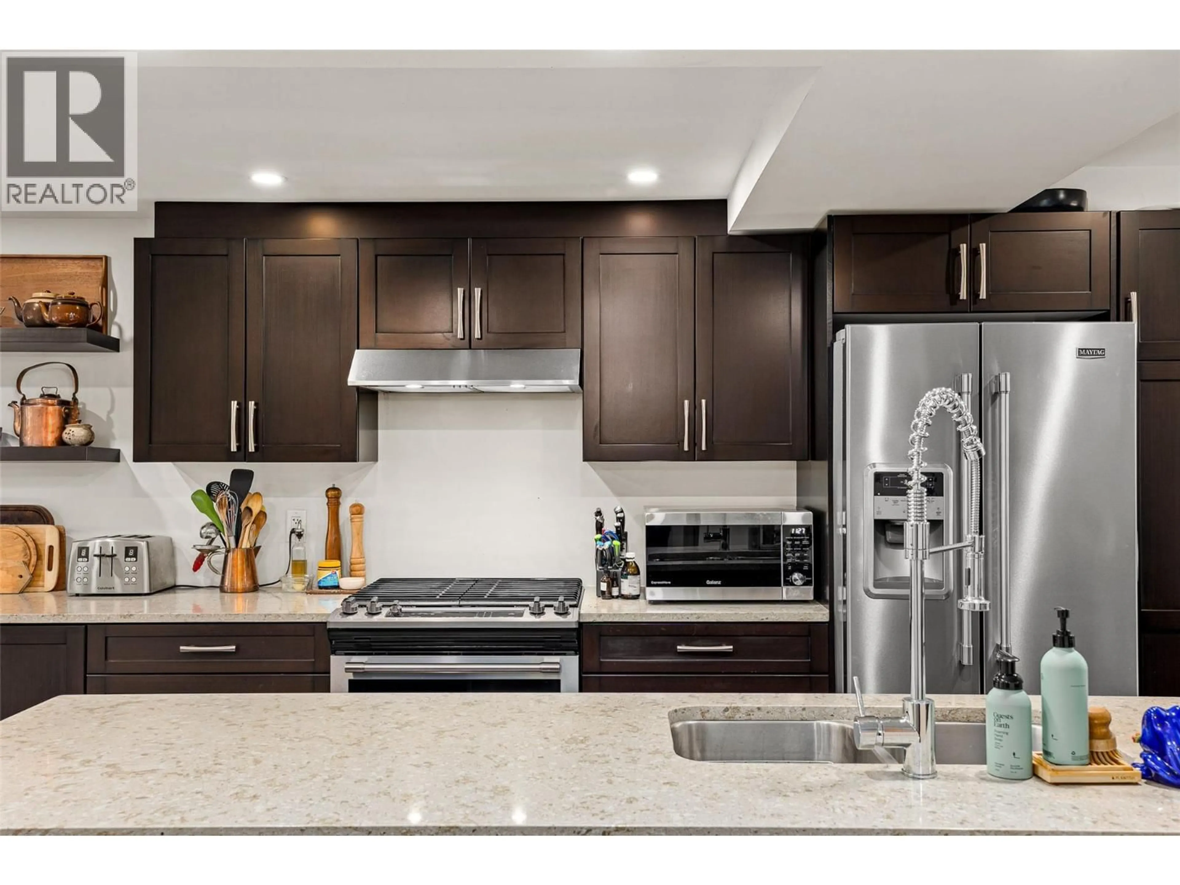 Contemporary kitchen, ceramic/tile floor for 210 - 2125 BURTCH ROAD, Kelowna British Columbia V1Y8N1
