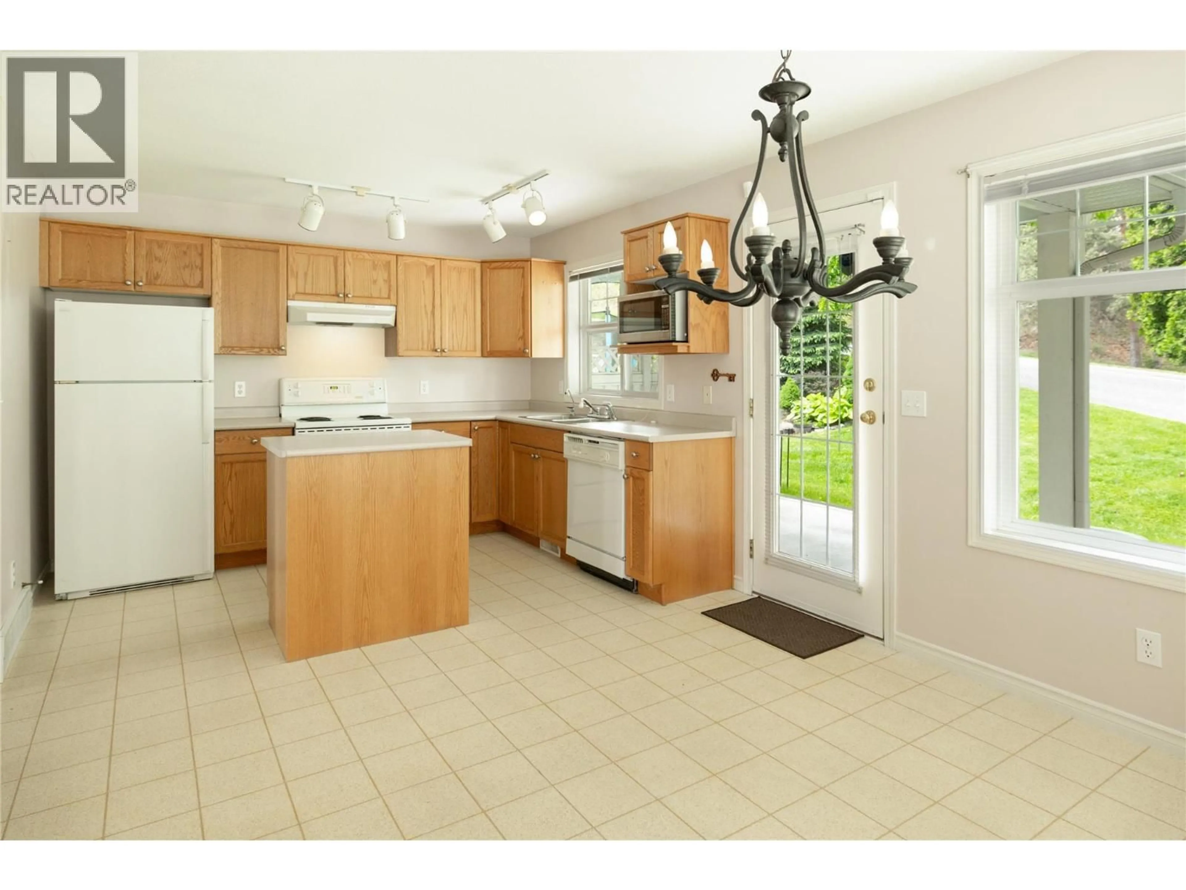 Open concept kitchen, ceramic/tile floor for 101 - 3825 GLEN CANYON DRIVE, West Kelowna British Columbia V4T2T4