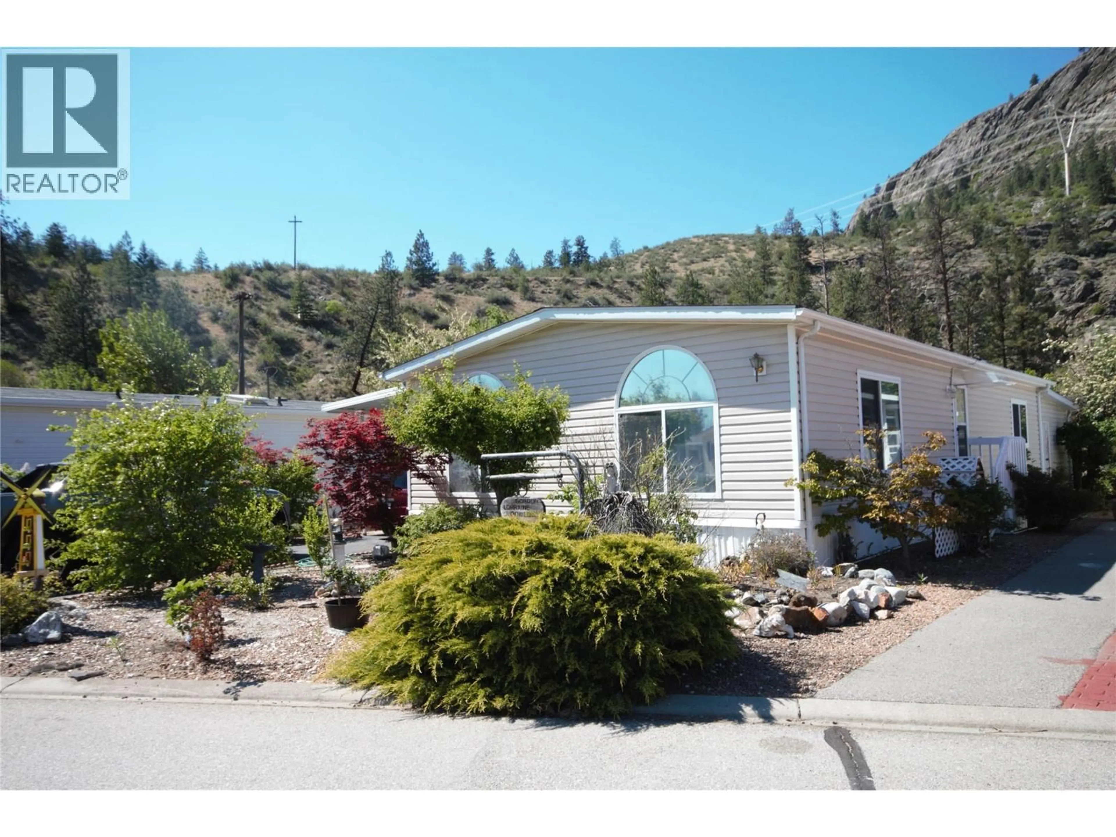 Home with vinyl exterior material, mountain view for 15 - 8598 HIGHWAY 97 OTHER, Oliver British Columbia V0H1T2