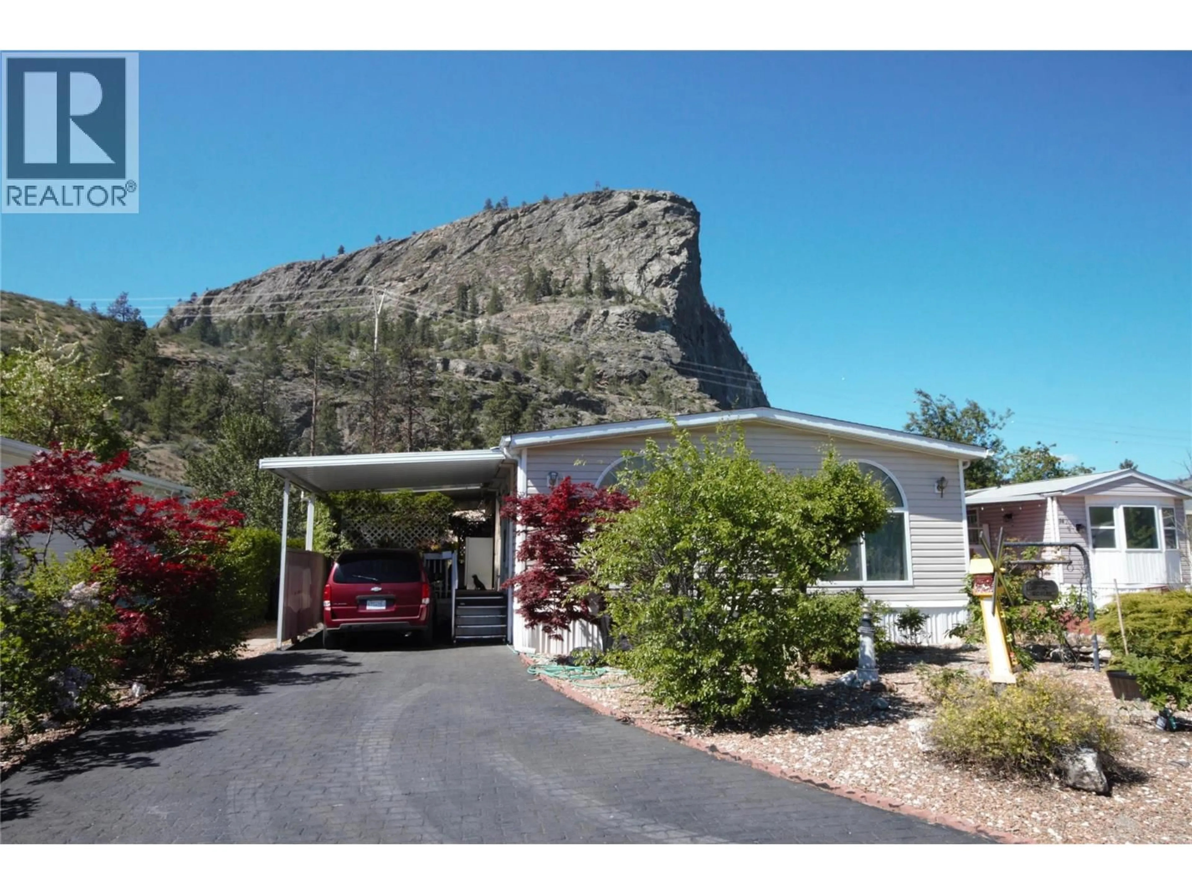 Home with vinyl exterior material, mountain view for 15 - 8598 HIGHWAY 97 OTHER, Oliver British Columbia V0H1T2
