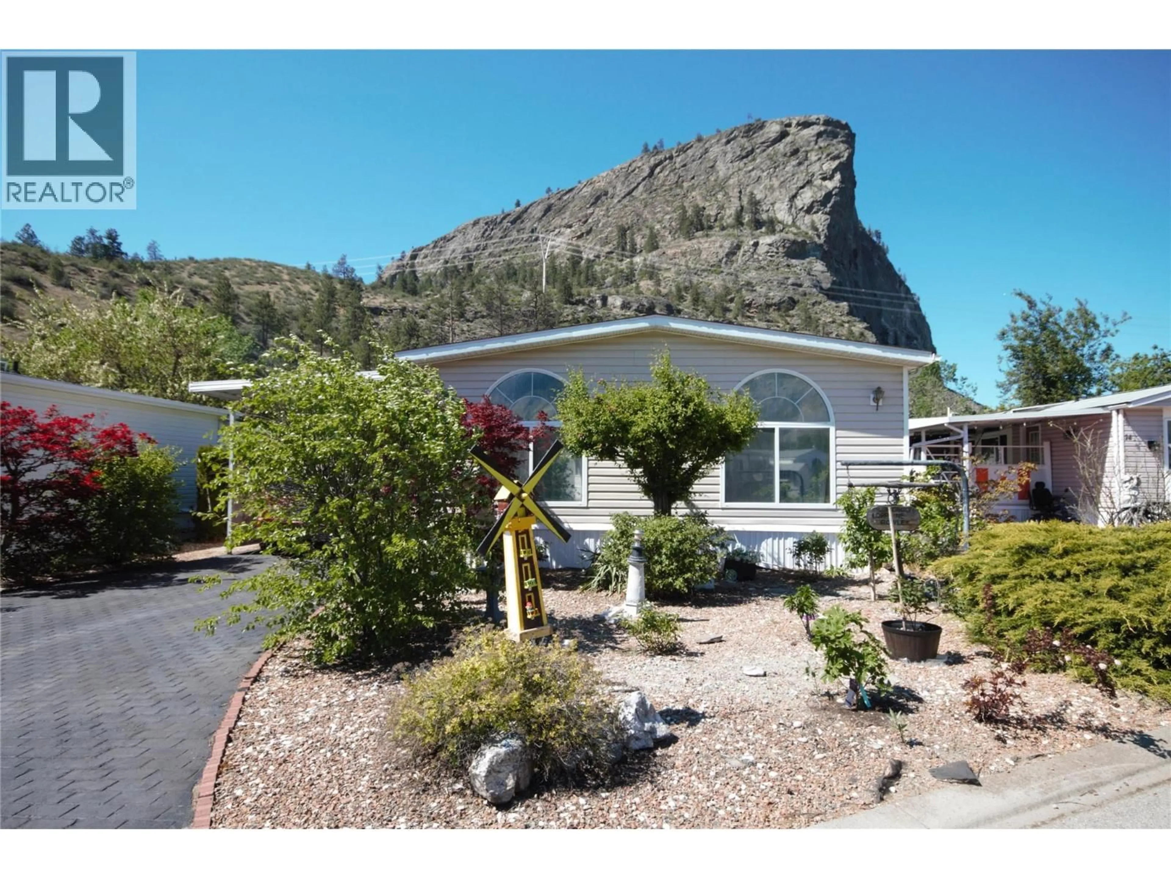 Home with vinyl exterior material, mountain view for 15 - 8598 HIGHWAY 97 OTHER, Oliver British Columbia V0H1T2