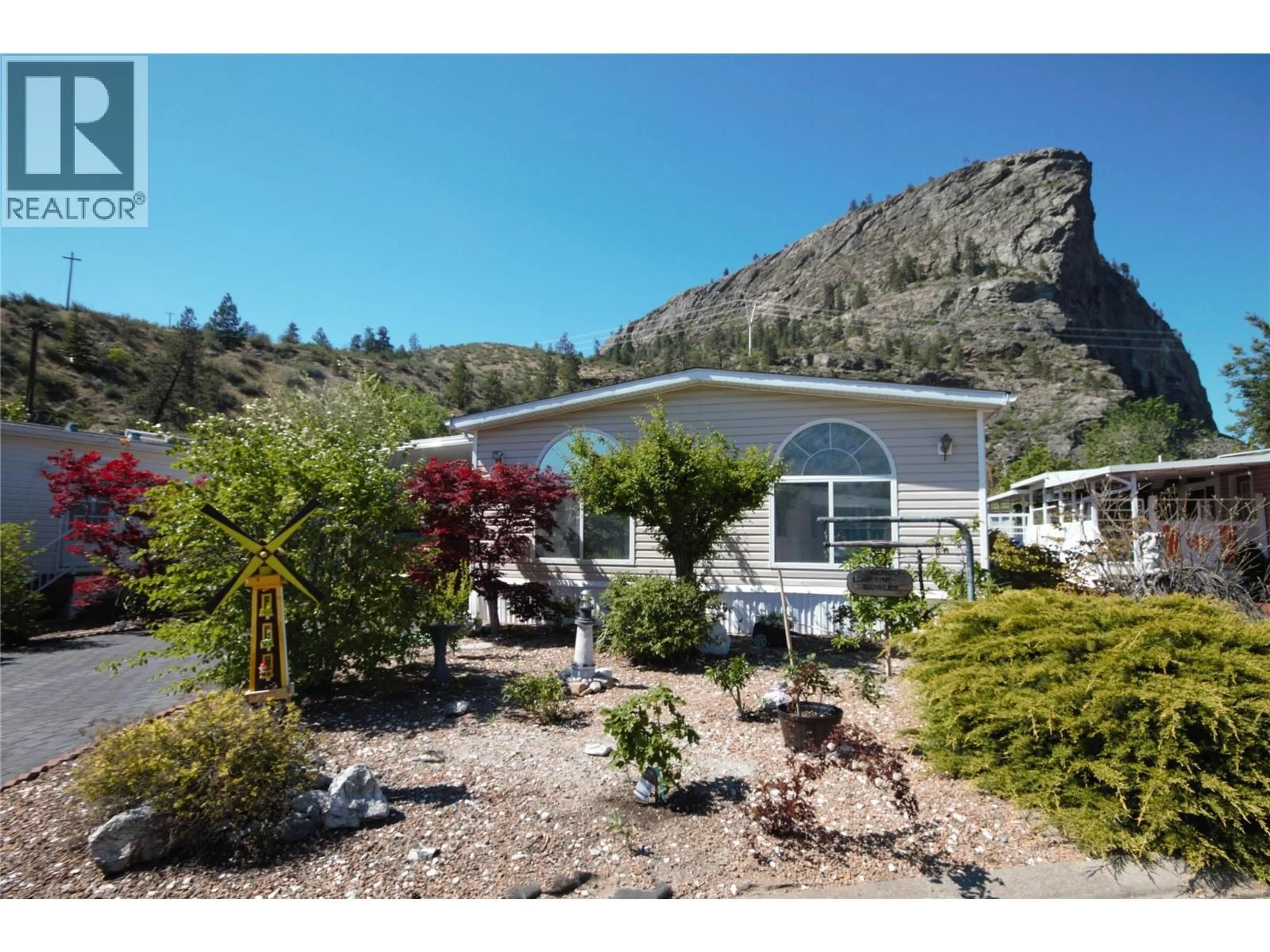 Home with vinyl exterior material, mountain view for 15 - 8598 HIGHWAY 97 OTHER, Oliver British Columbia V0H1T2