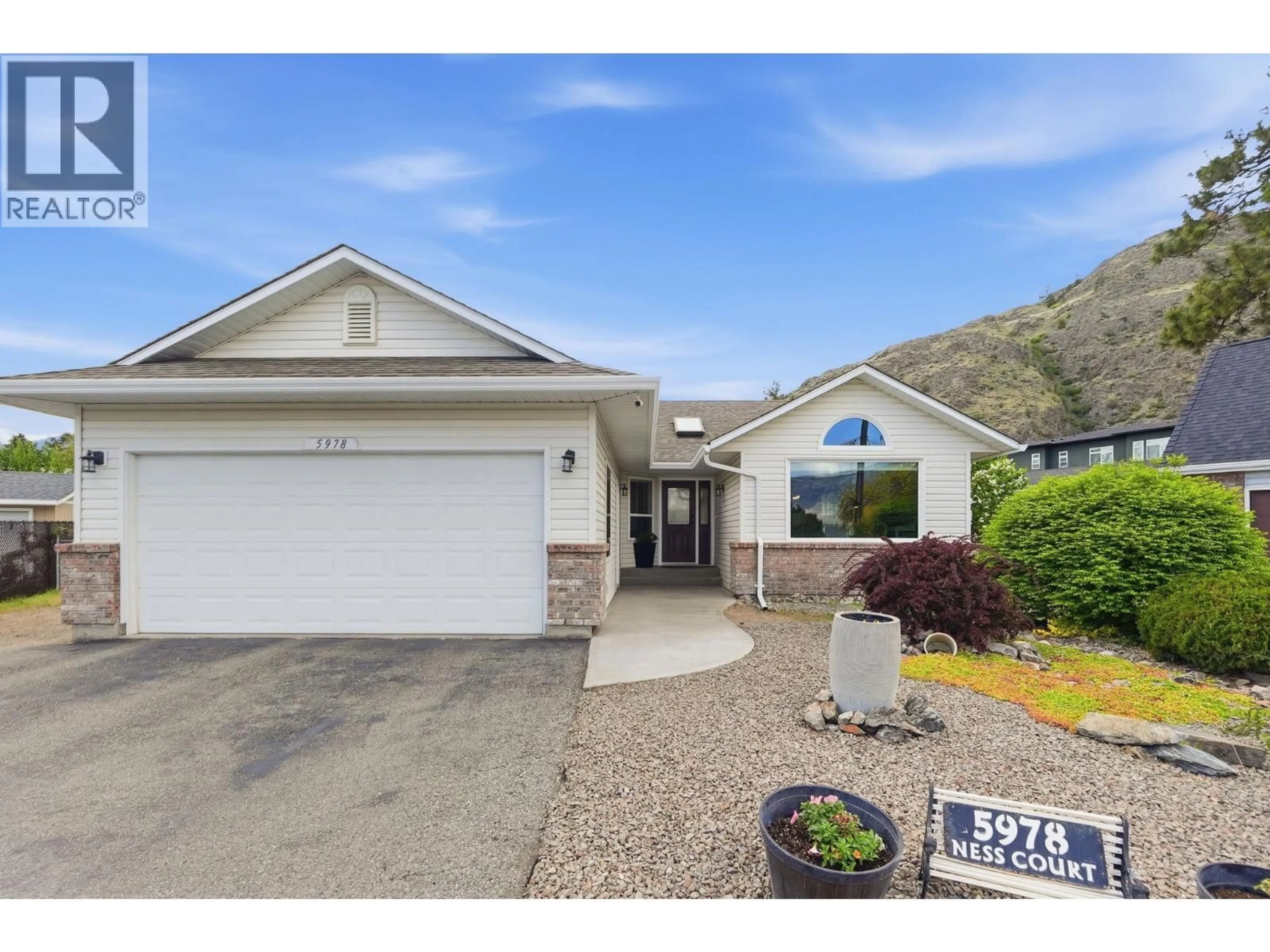 Home with vinyl exterior material, mountain view for 5978 NESS COURT, Oliver British Columbia V0H1T0