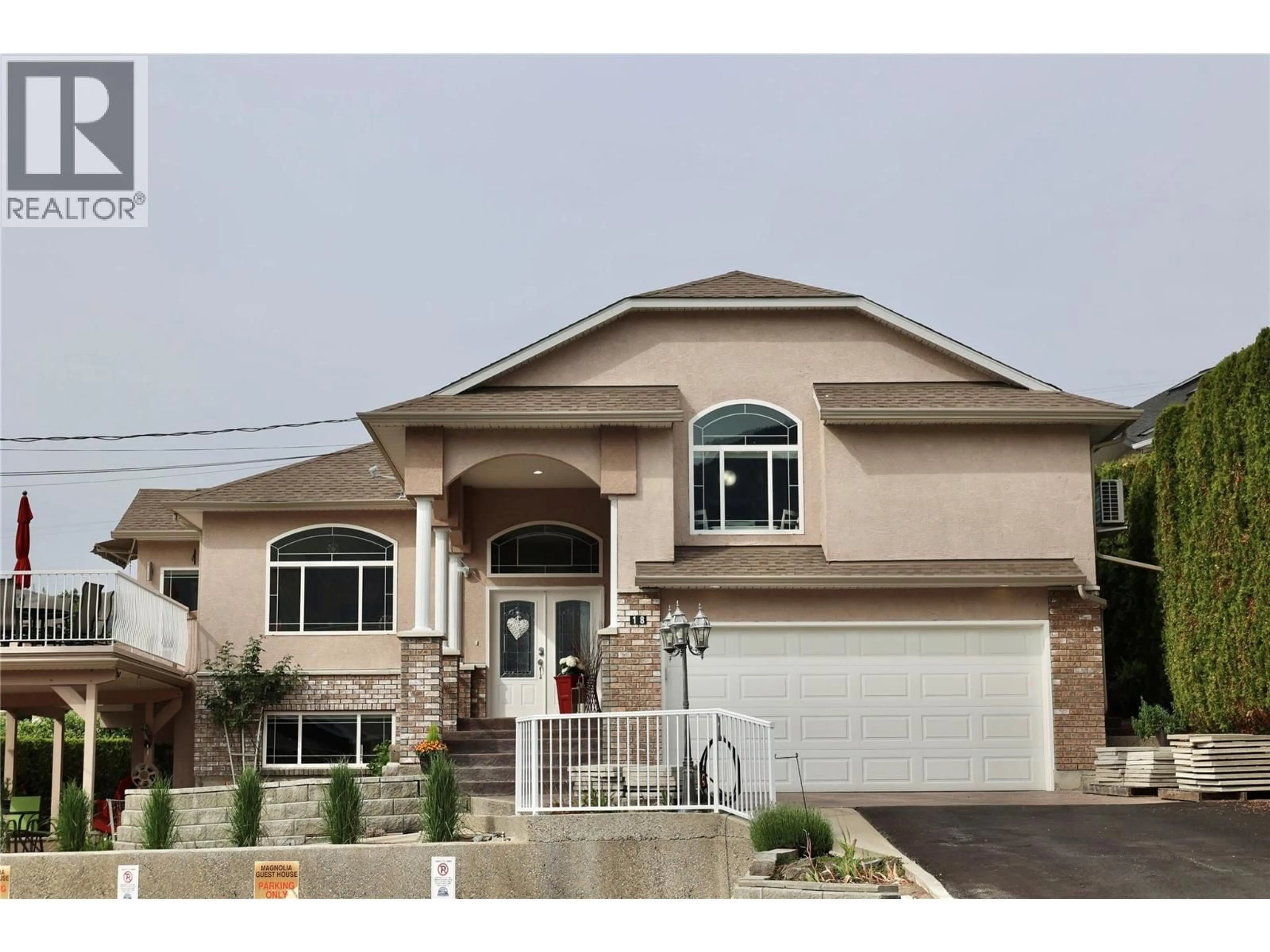 Home with vinyl exterior material, street for 18 MAGNOLIA PLACE, Osoyoos British Columbia V0H1V1