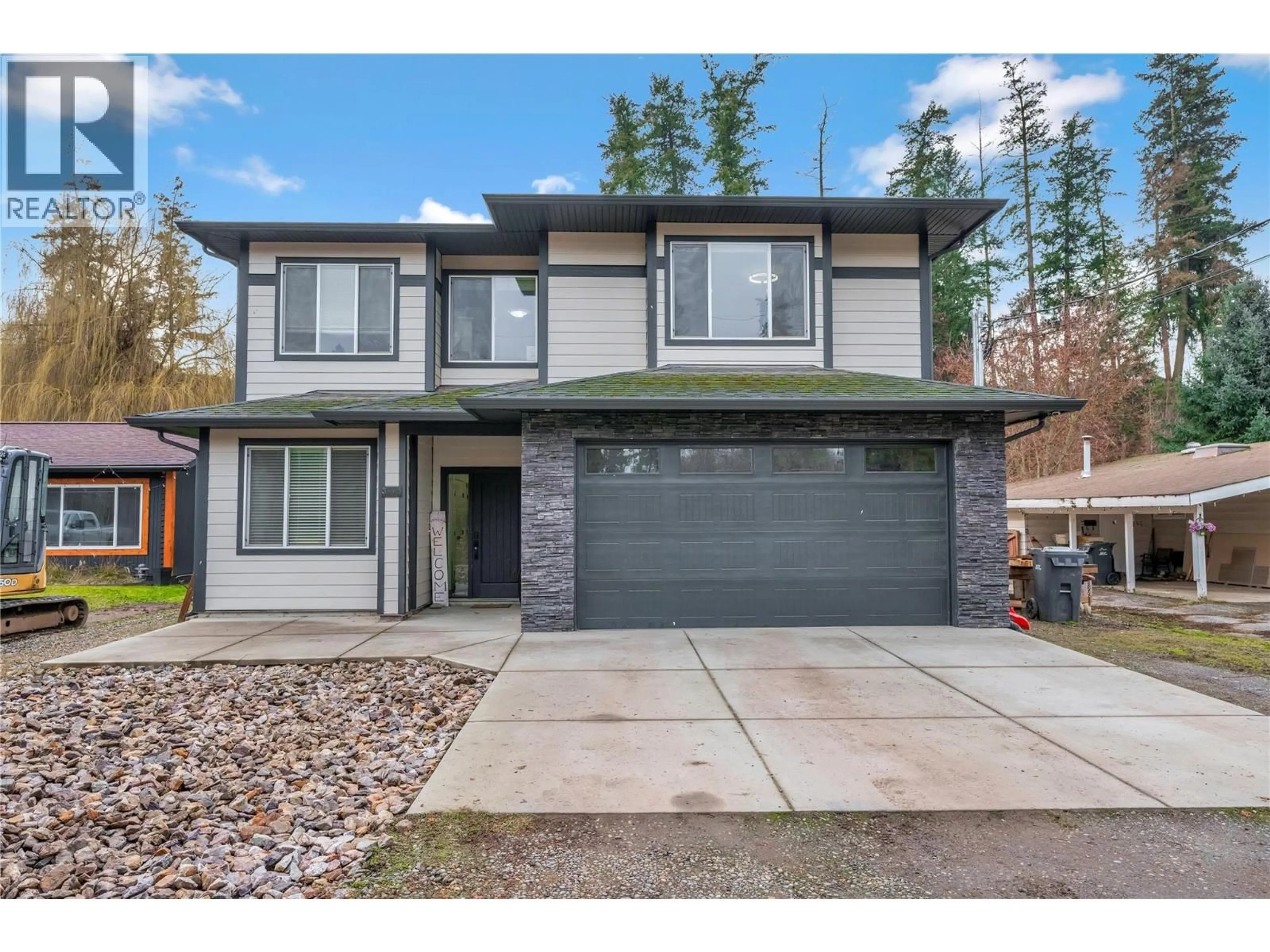 Home with vinyl exterior material, street for 3445 JACKSON AVENUE, Armstrong British Columbia V0E1B2