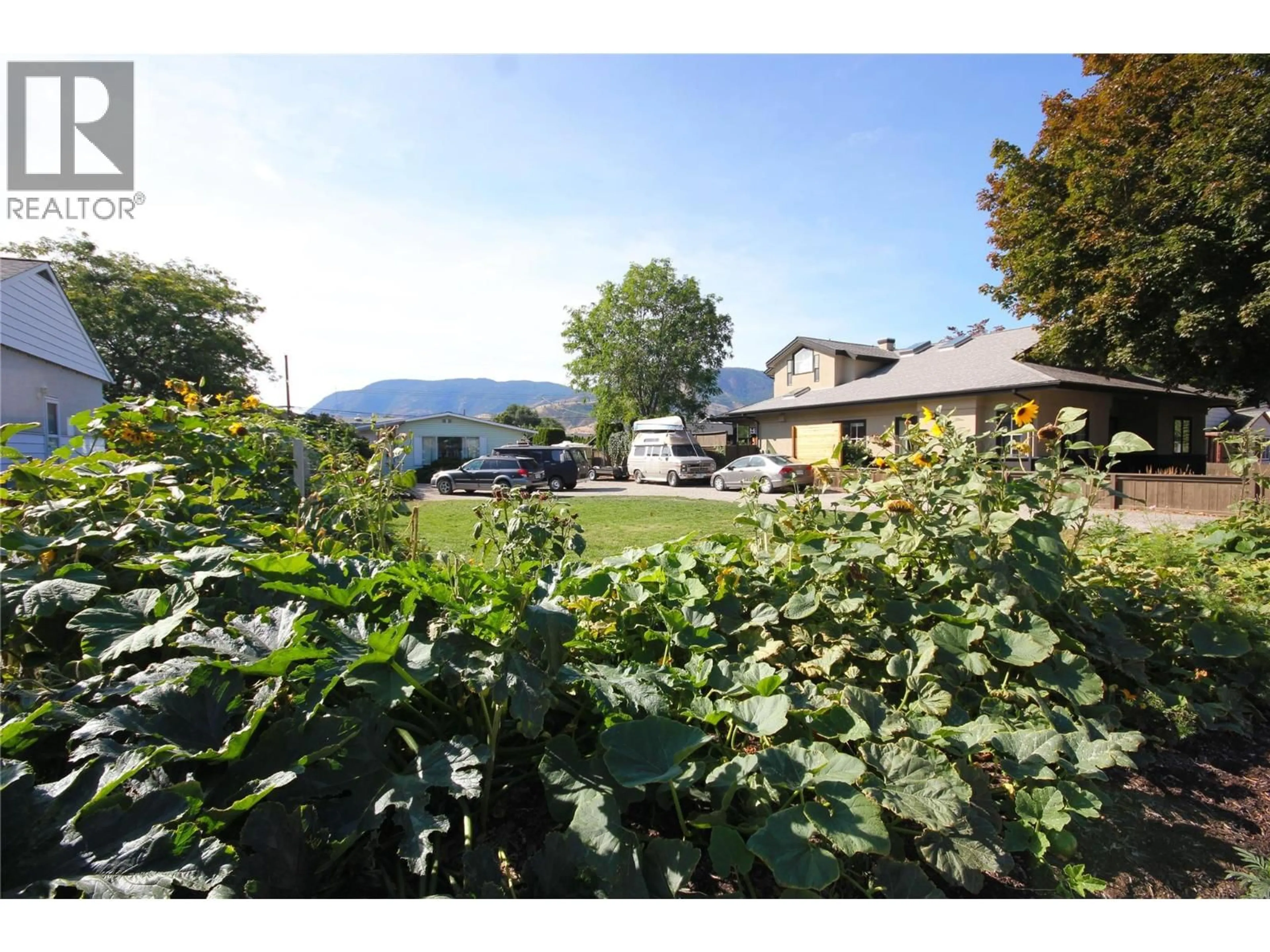 A pic from outside/outdoor area/front of a property/back of a property/a pic from drone, mountain view for 402 CONKLIN AVENUE, Penticton British Columbia V2A2T4