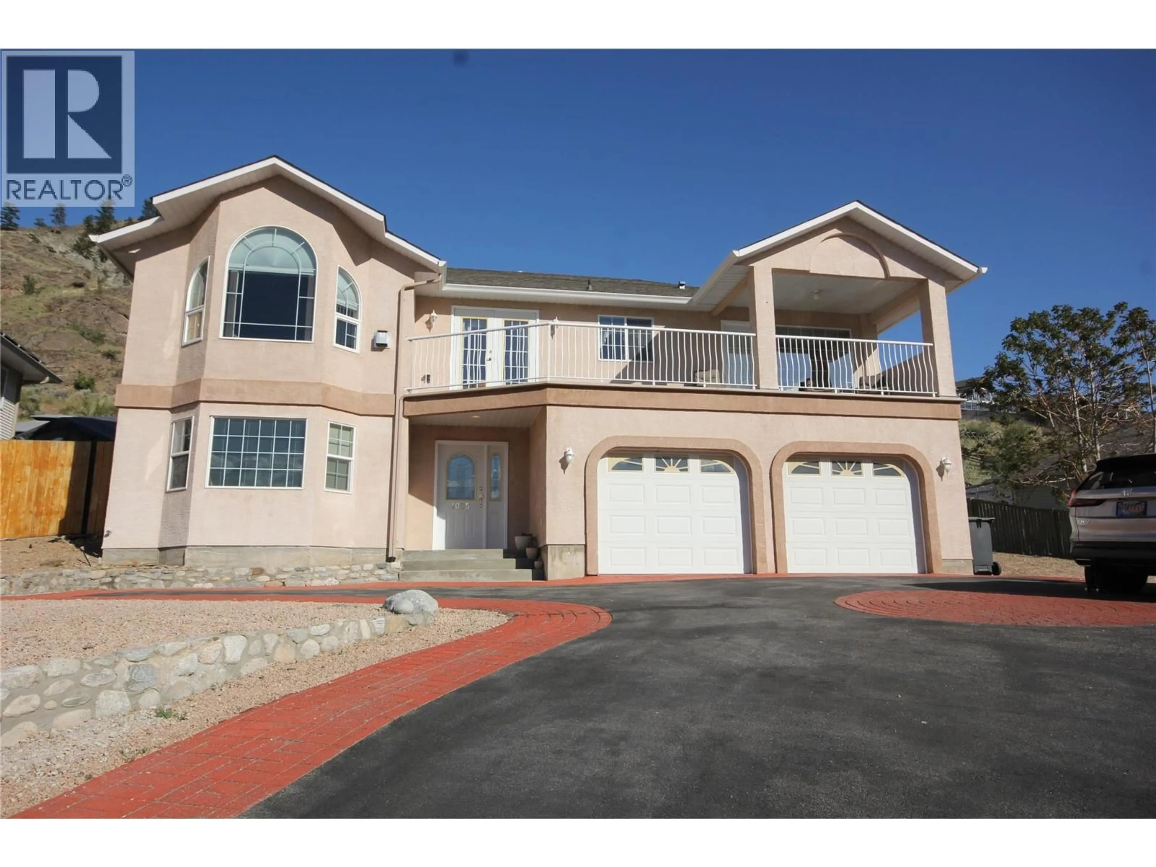 Home with vinyl exterior material, street for 1035 PEACHCLIFF DRIVE, Okanagan Falls British Columbia V0H1R1