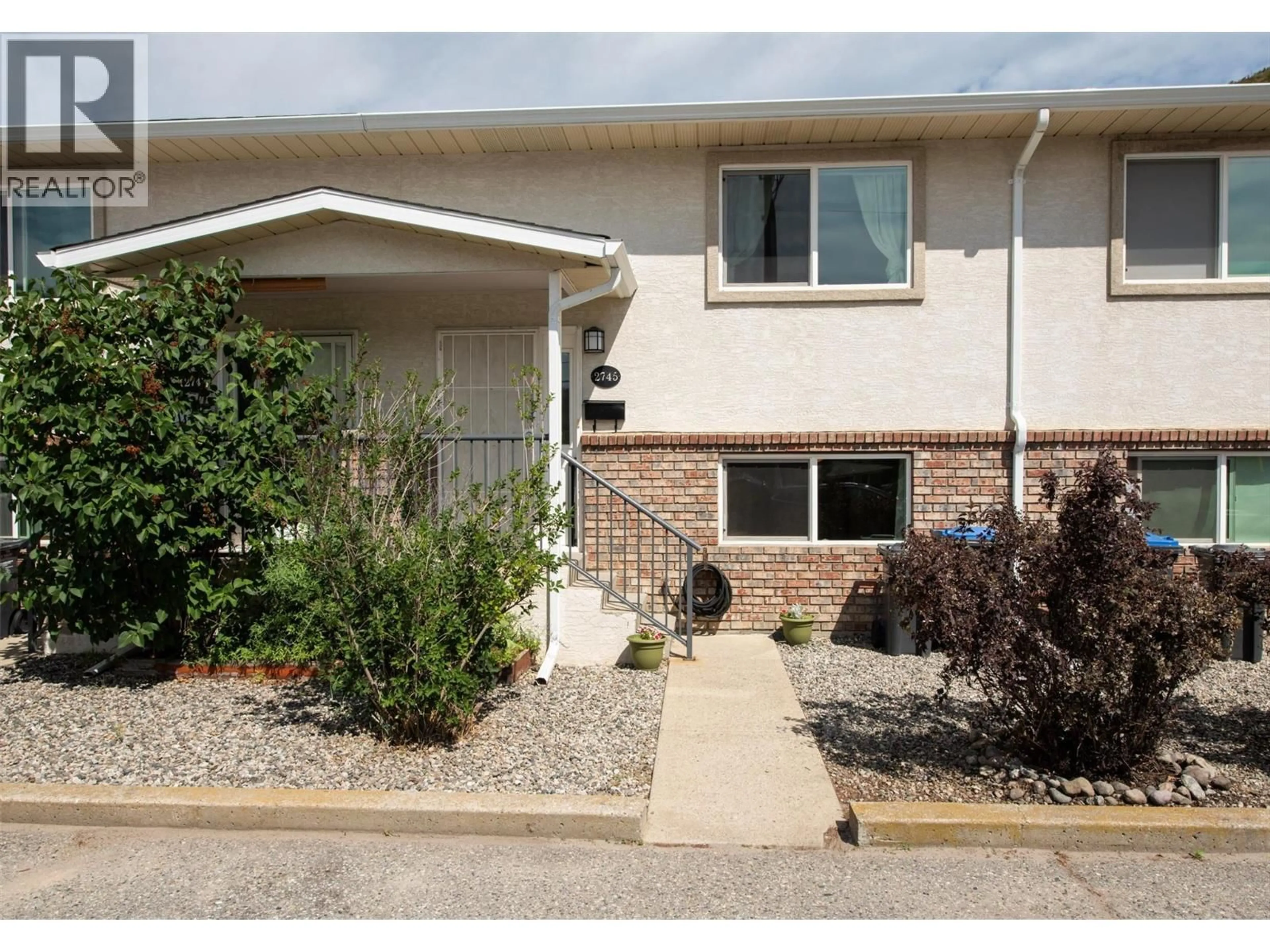 Home with vinyl exterior material, street for 2745 CAMERON ROAD, West Kelowna British Columbia V1Z3K5