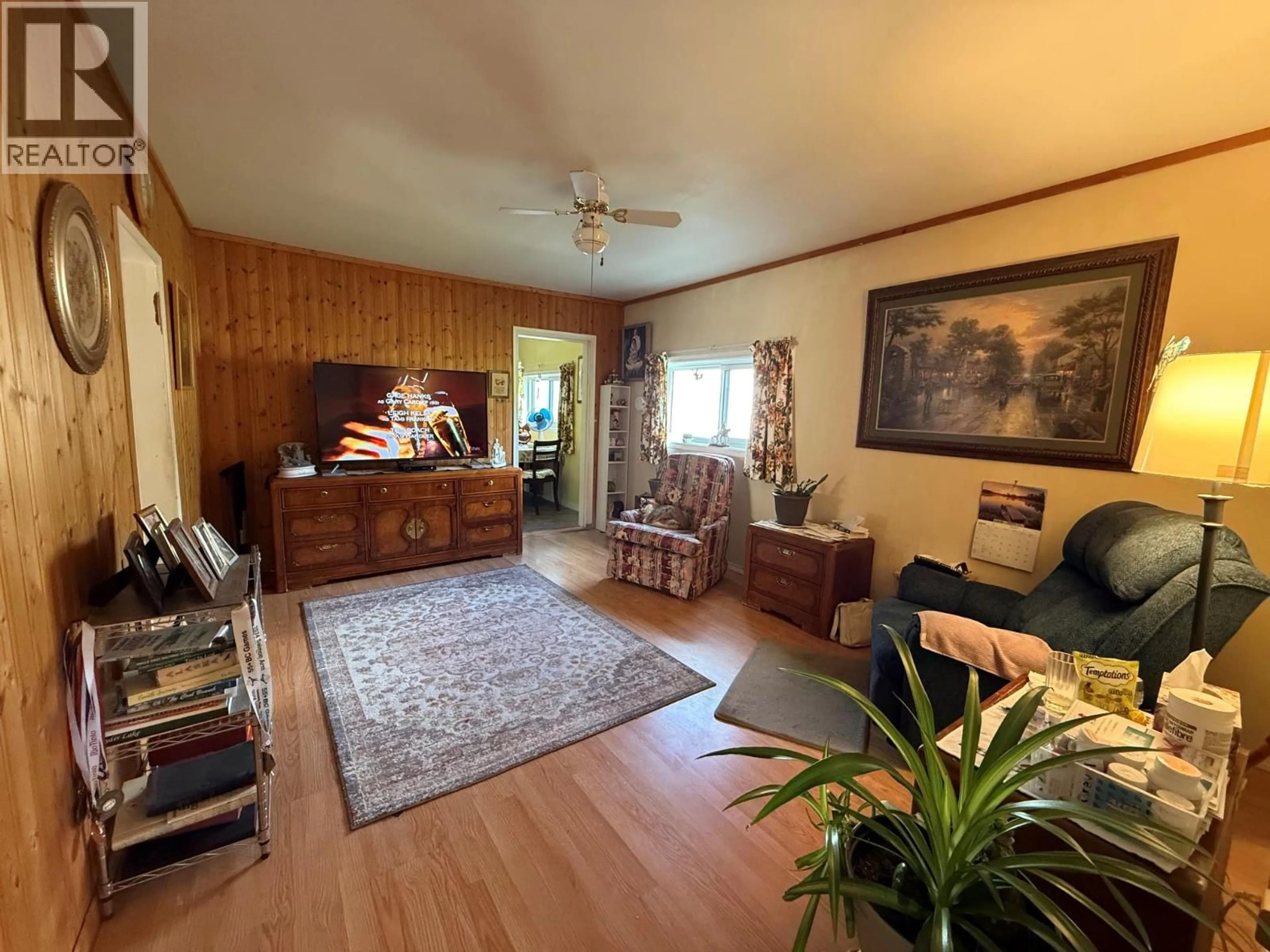 Living room with furniture, wood/laminate floor for 9889 LATREMOUILLE STREET, Little Fort British Columbia V0E2C0
