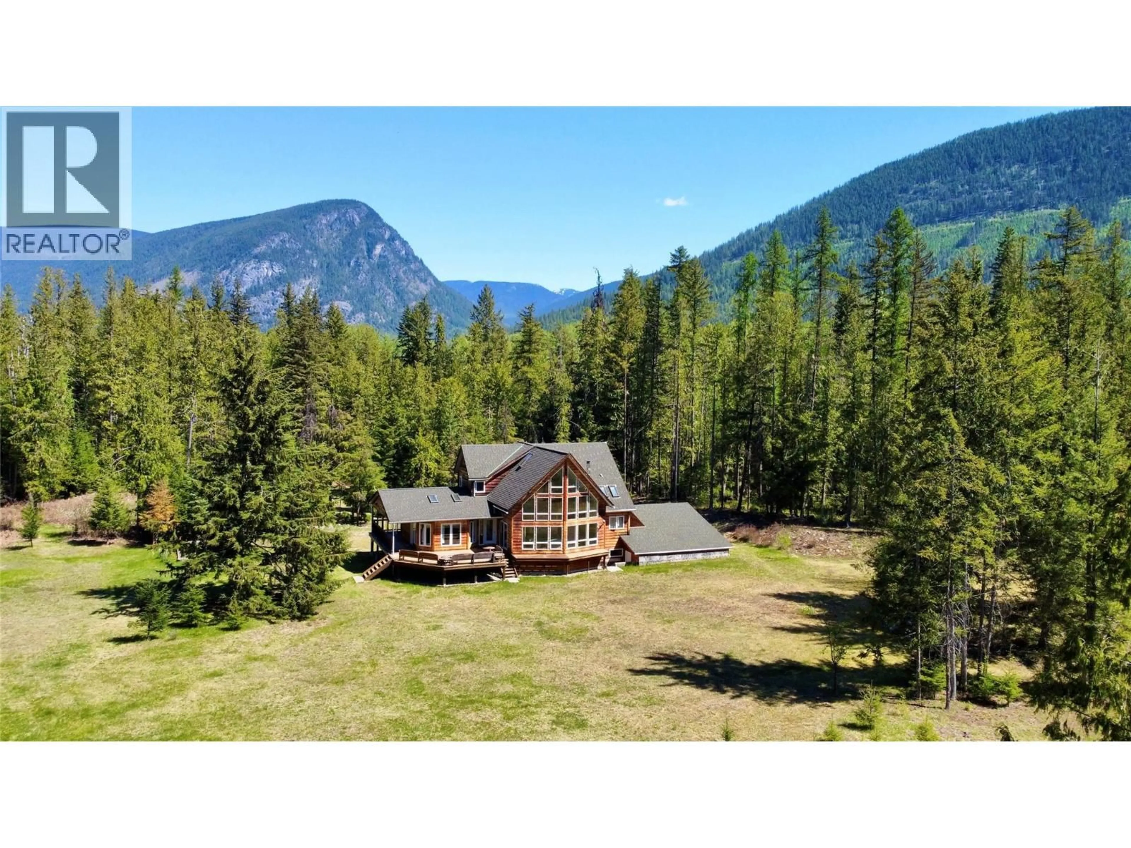 A pic from outside/outdoor area/front of a property/back of a property/a pic from drone, mountain view for 390 SILVER QUEEN ROAD, Burton British Columbia V0G1R0