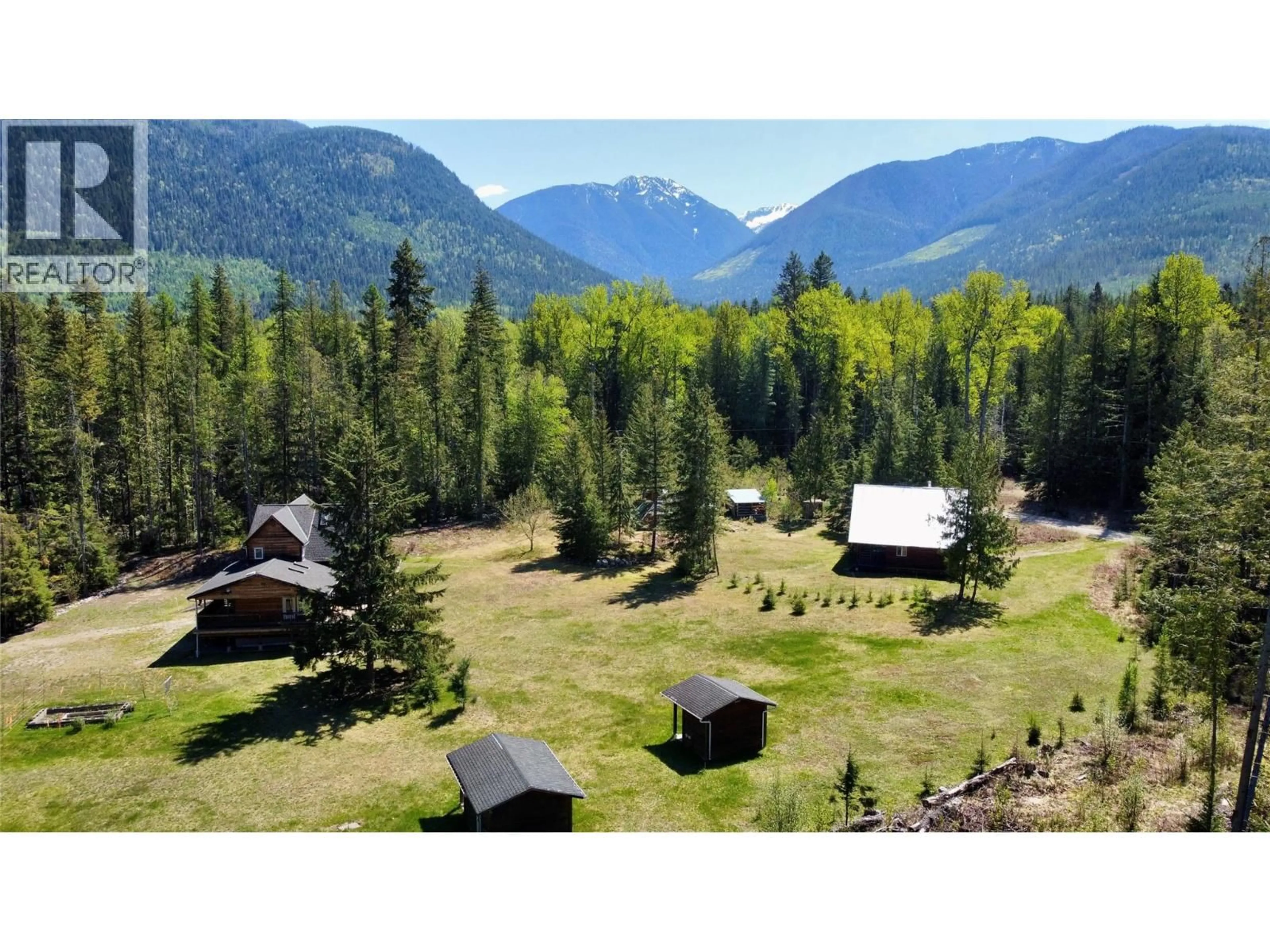 A pic from outside/outdoor area/front of a property/back of a property/a pic from drone, mountain view for 390 SILVER QUEEN ROAD, Burton British Columbia V0G1R0