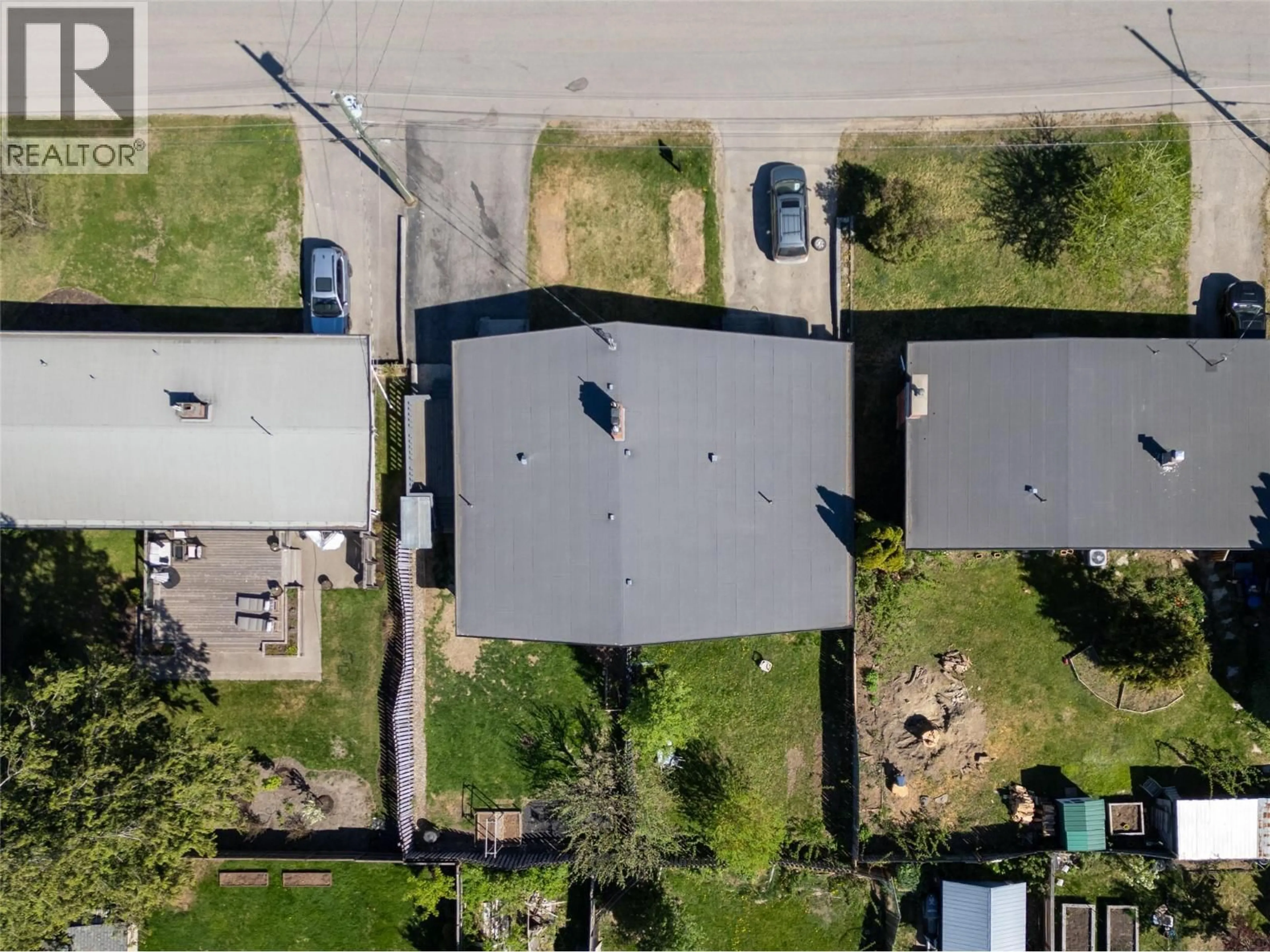 A pic from outside/outdoor area/front of a property/back of a property/a pic from drone, street for B - 1971 FAIRWAY ROAD, Revelstoke British Columbia V0E2S0