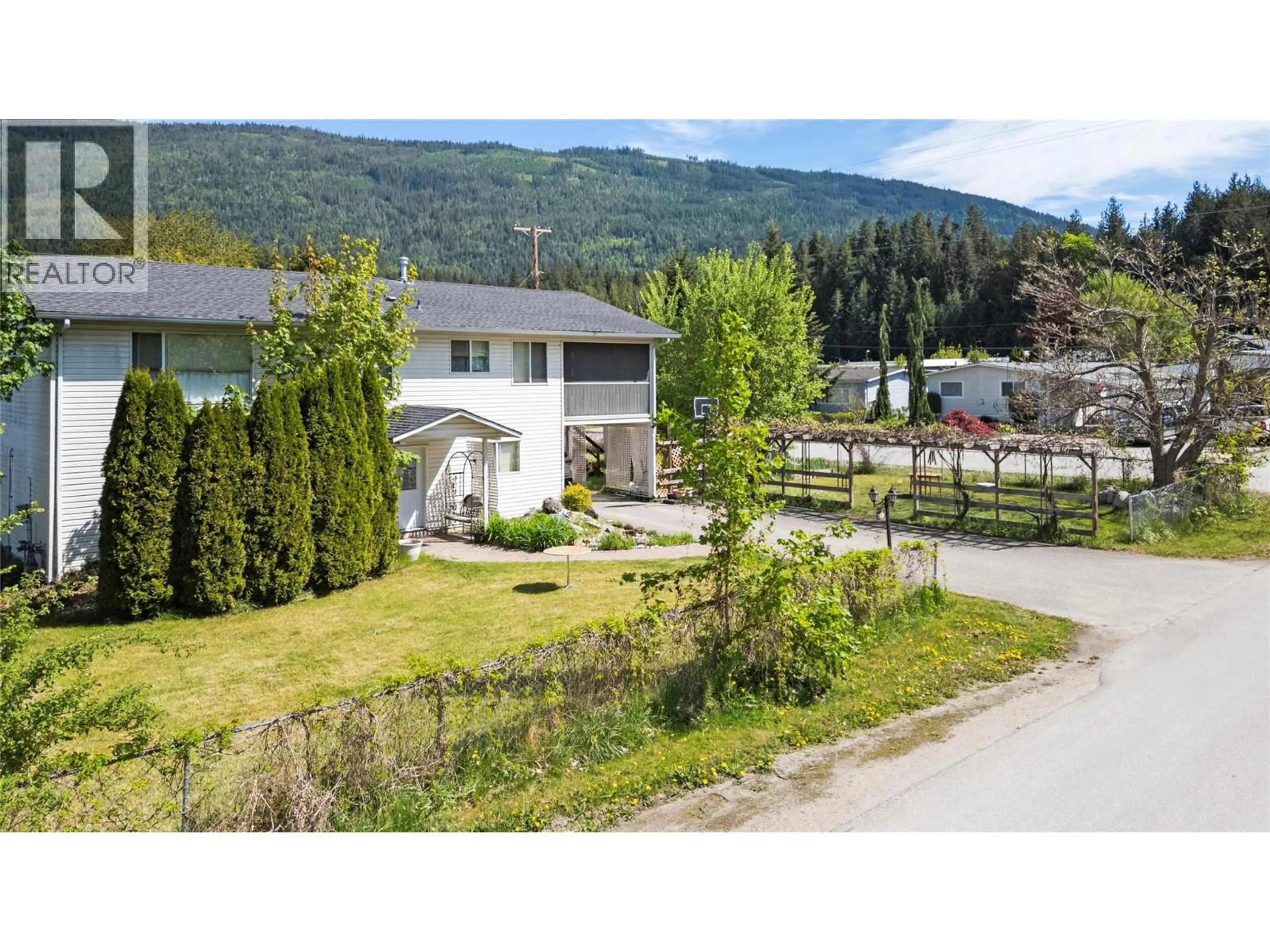 A pic from outside/outdoor area/front of a property/back of a property/a pic from drone, mountain view for 7020 51 STREET NORTHEAST, Salmon Arm British Columbia V0E1K0