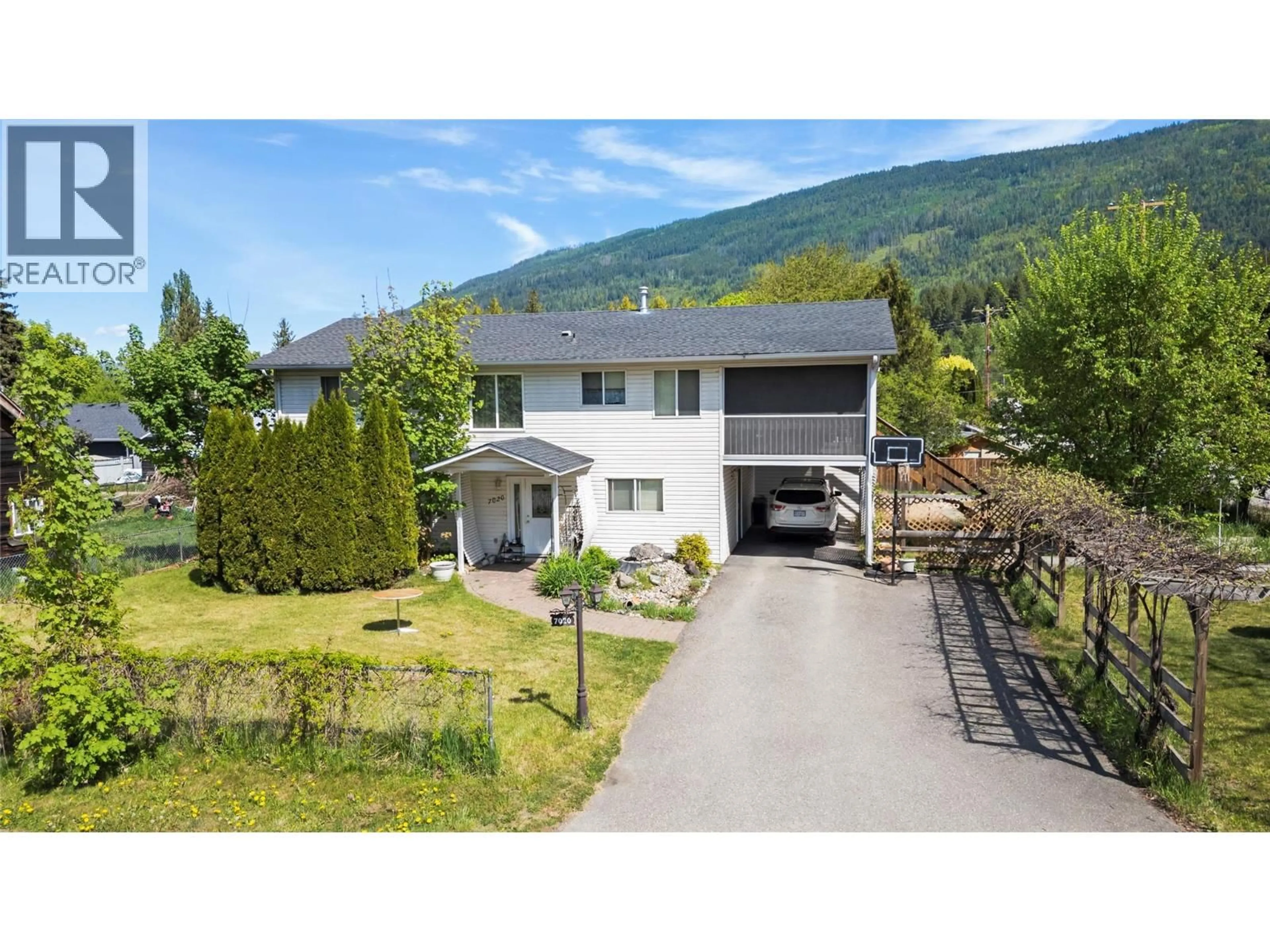 A pic from outside/outdoor area/front of a property/back of a property/a pic from drone, mountain view for 7020 51 STREET NORTHEAST, Salmon Arm British Columbia V0E1K0