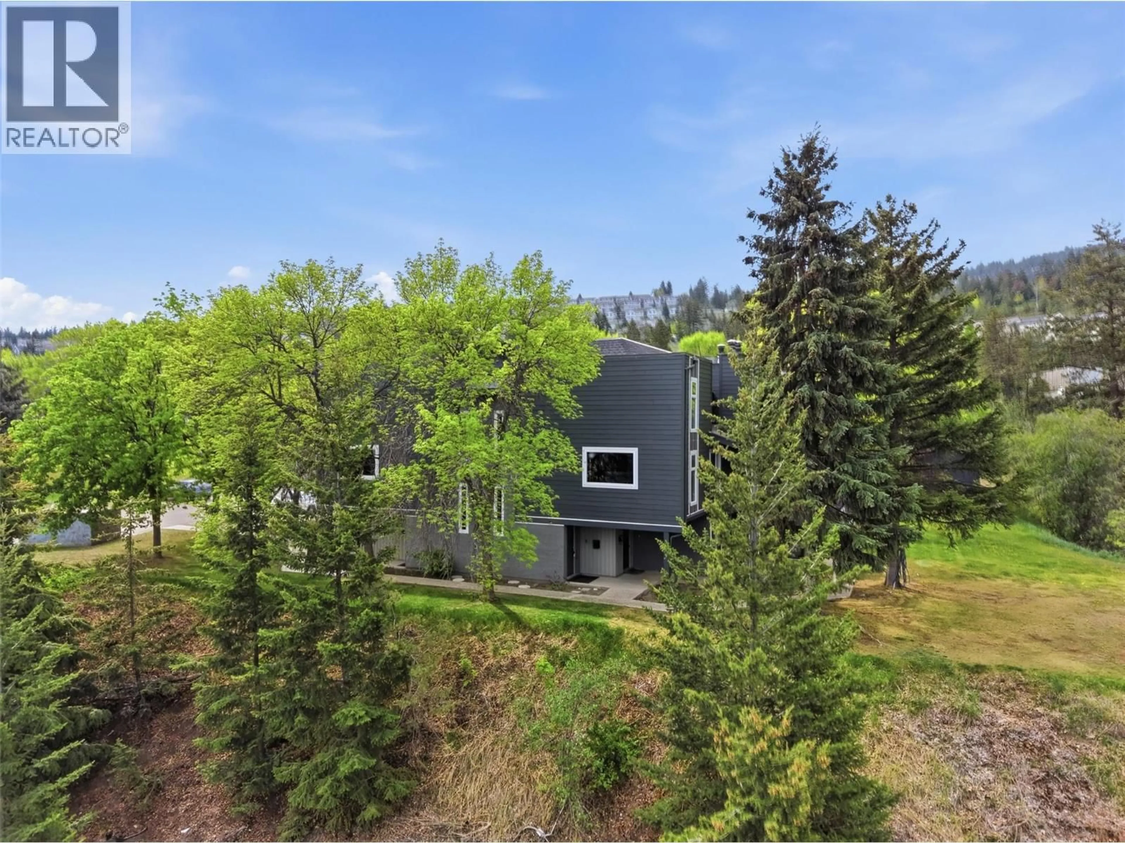 A pic from outside/outdoor area/front of a property/back of a property/a pic from drone, forest/trees view for 53 - 1221 HUGH ALLAN DRIVE, Kamloops British Columbia V1S1M7