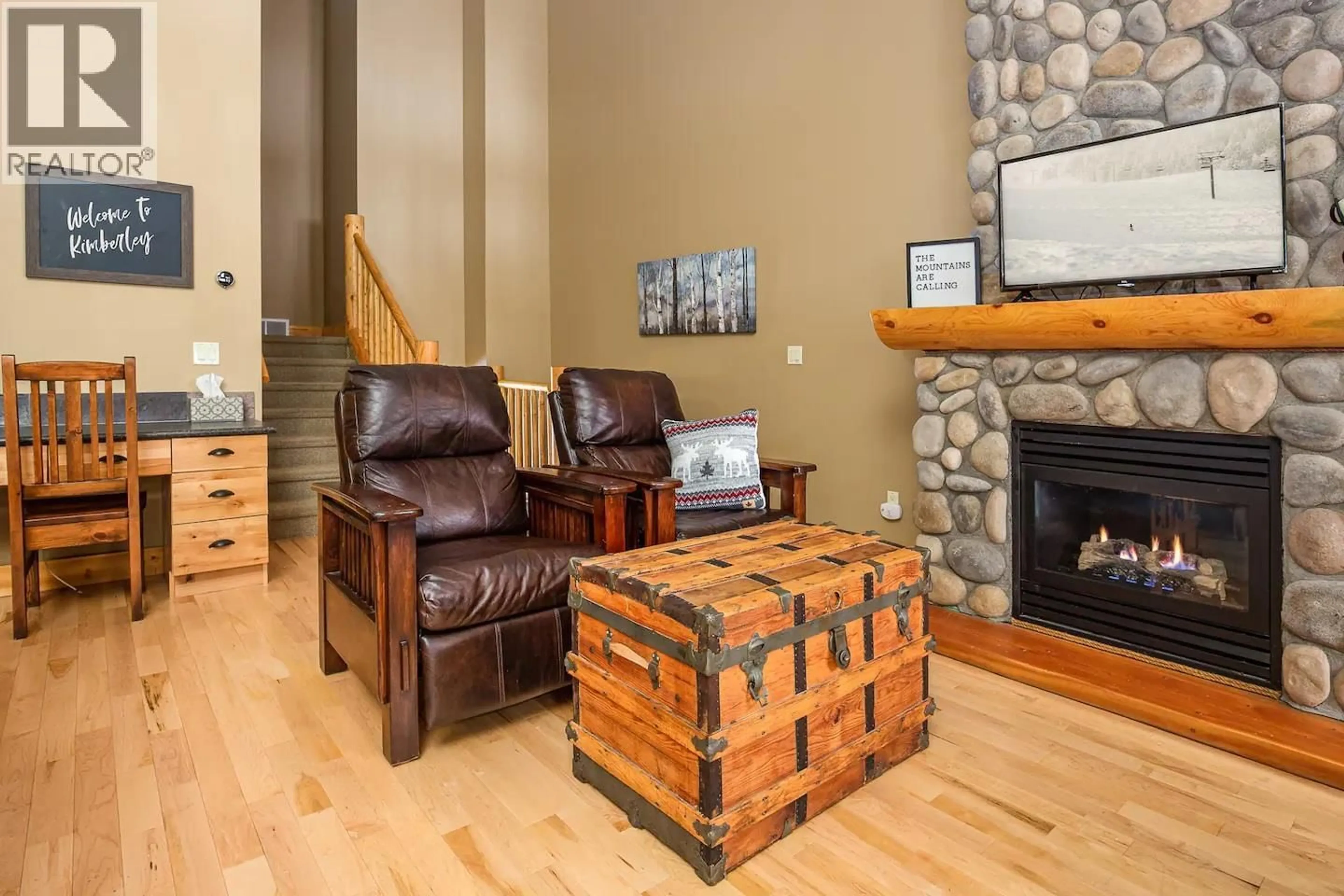 Living room with furniture, wood/laminate floor for 341 FAIRWAY DRIVE, Kimberley British Columbia V1A0B7