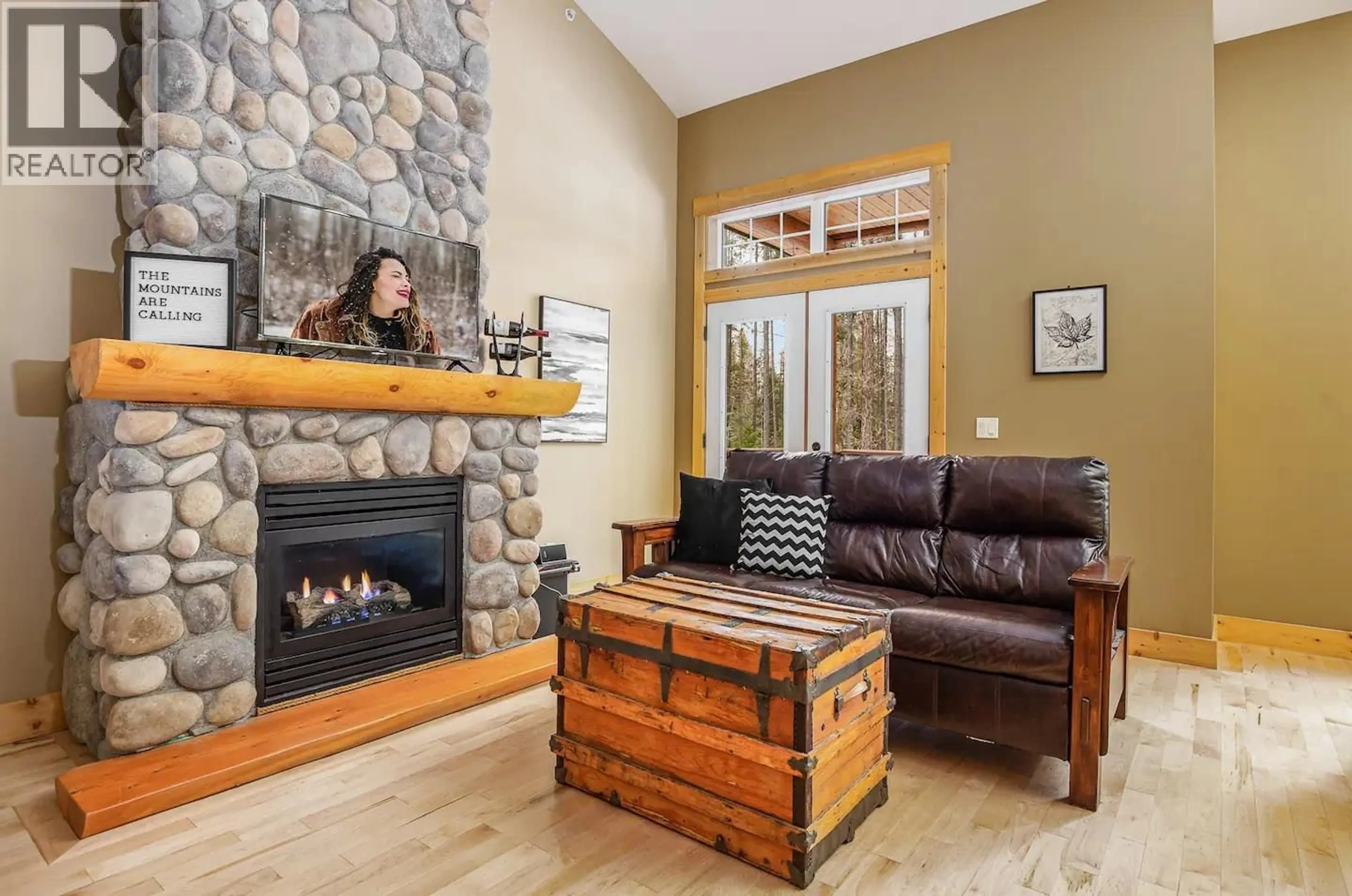 Living room with furniture, wood/laminate floor for 341 FAIRWAY DRIVE, Kimberley British Columbia V1A0B7